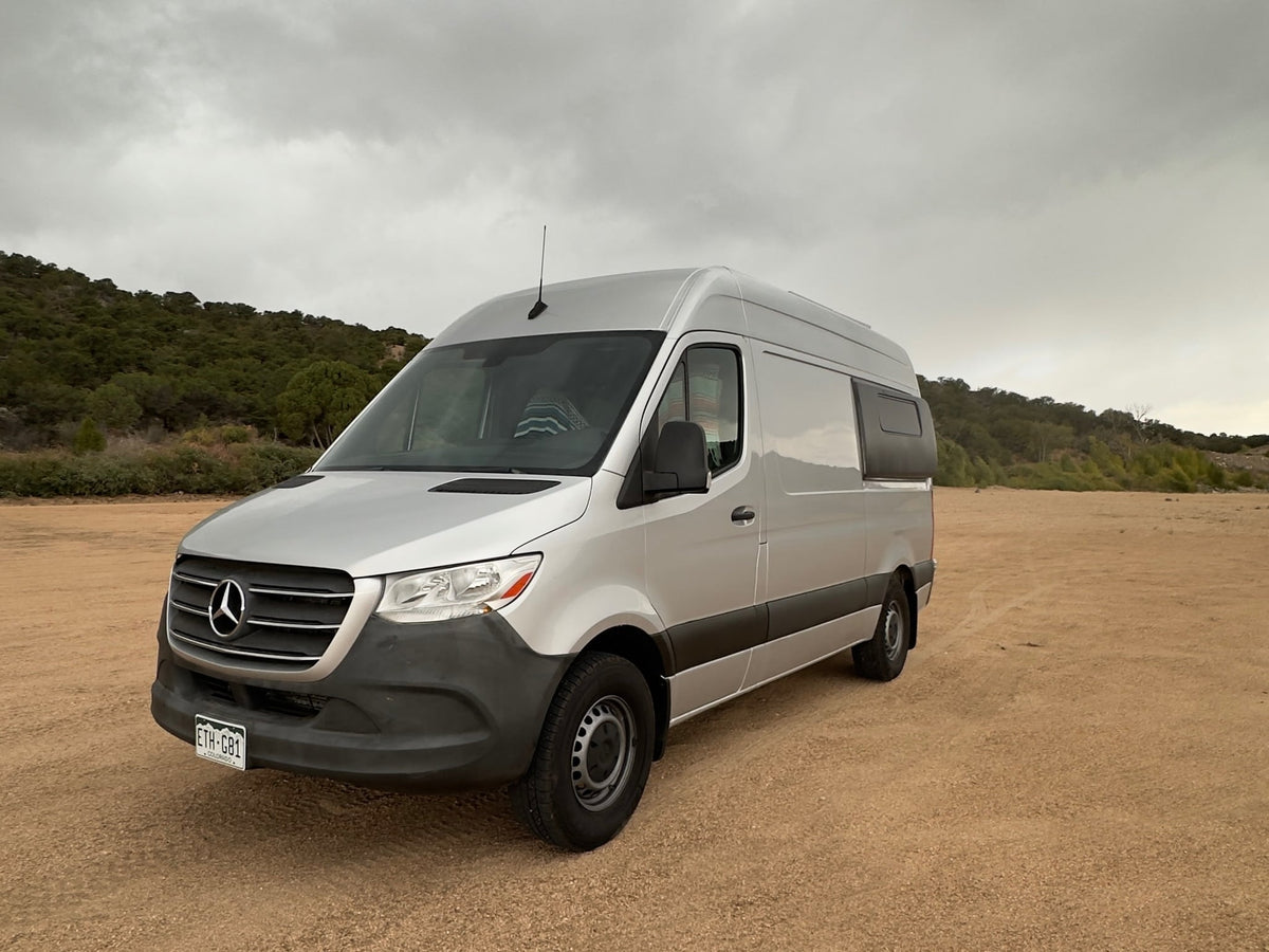 cloudy landscape.|Silver Mercedes Sprinter van — photo 4