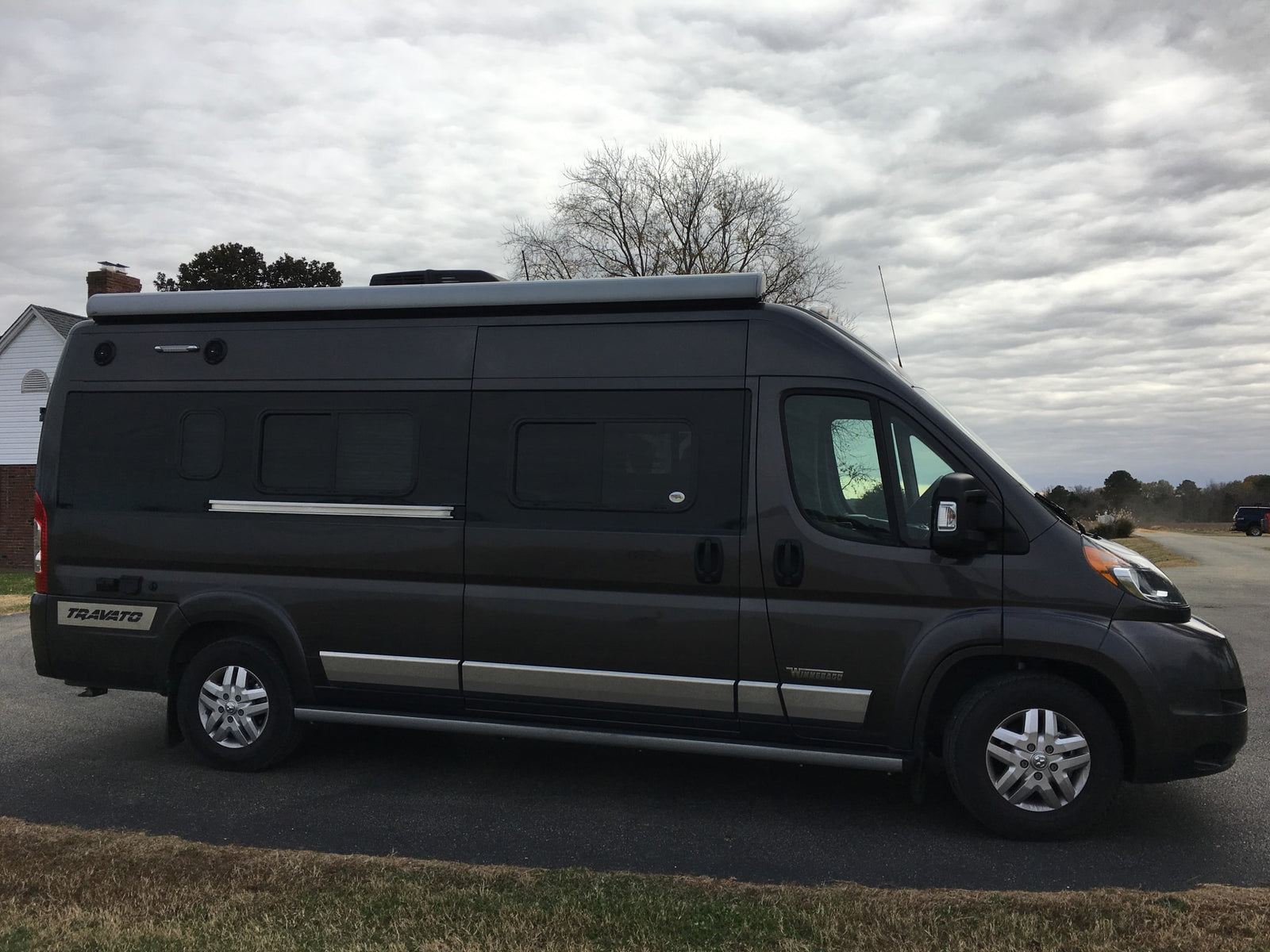 and wood overhead cabinets.|Inside an RV rental