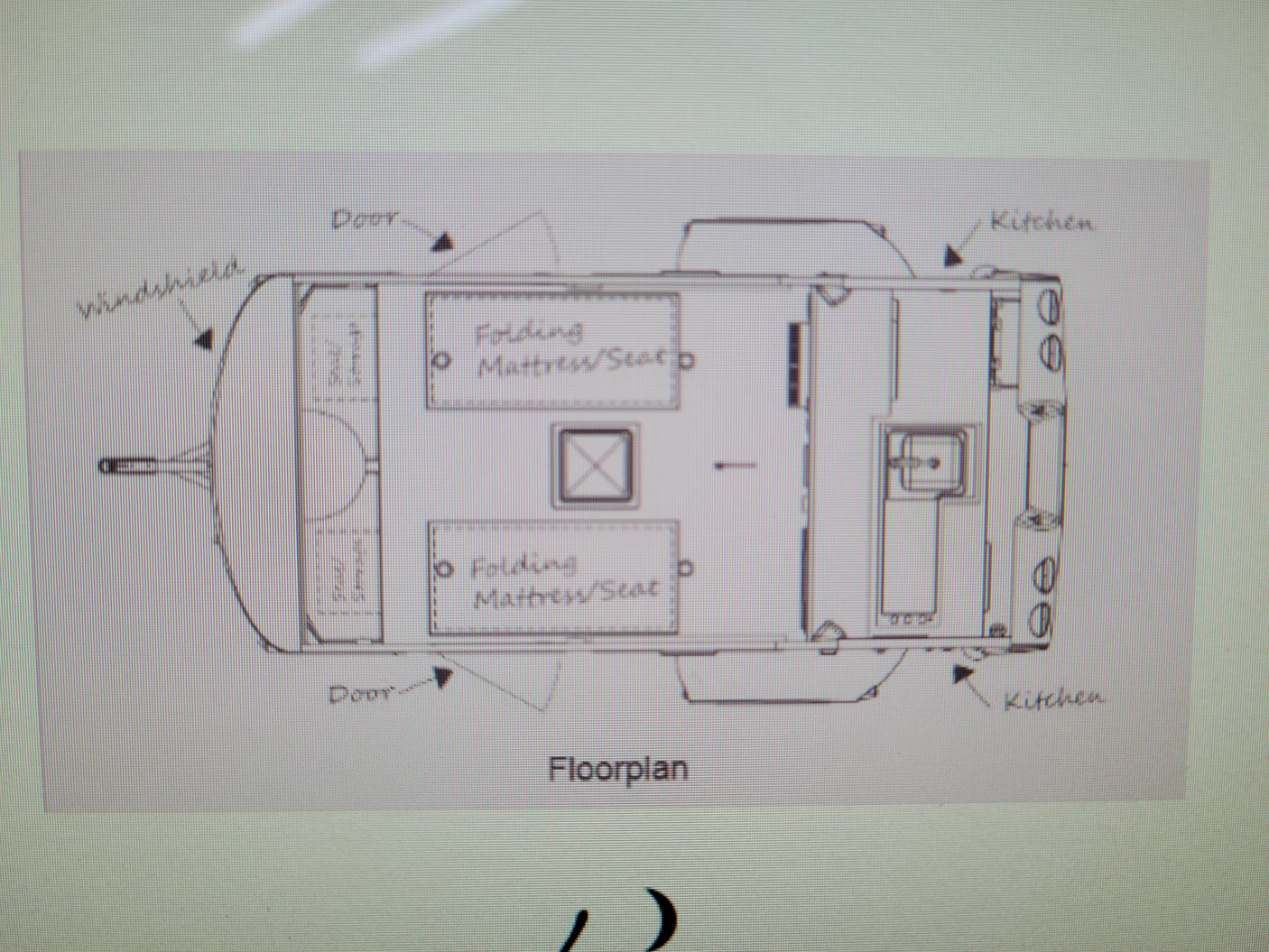 RV rental floorplan shows a compact camper with folding mattress/seats and kitchen layout.