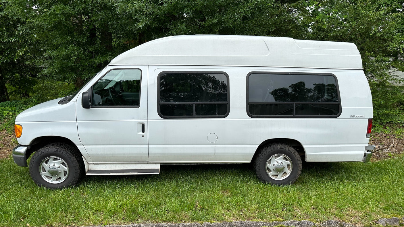 White high-top conversion van for rv rental