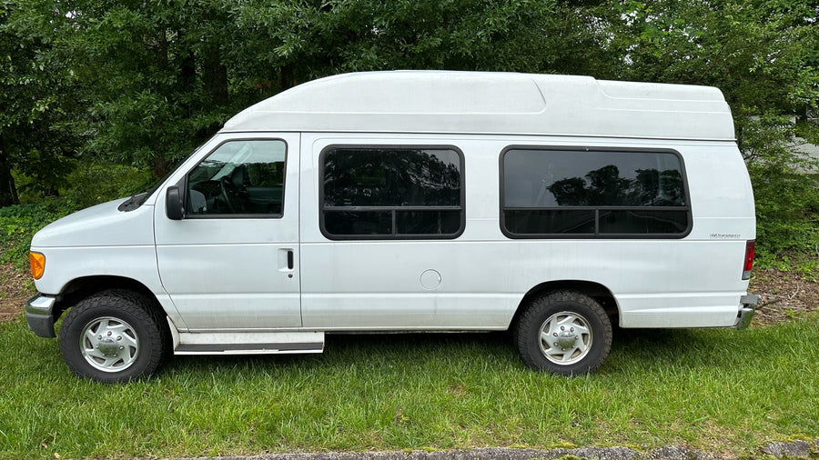 White high-top conversion van for rv rental