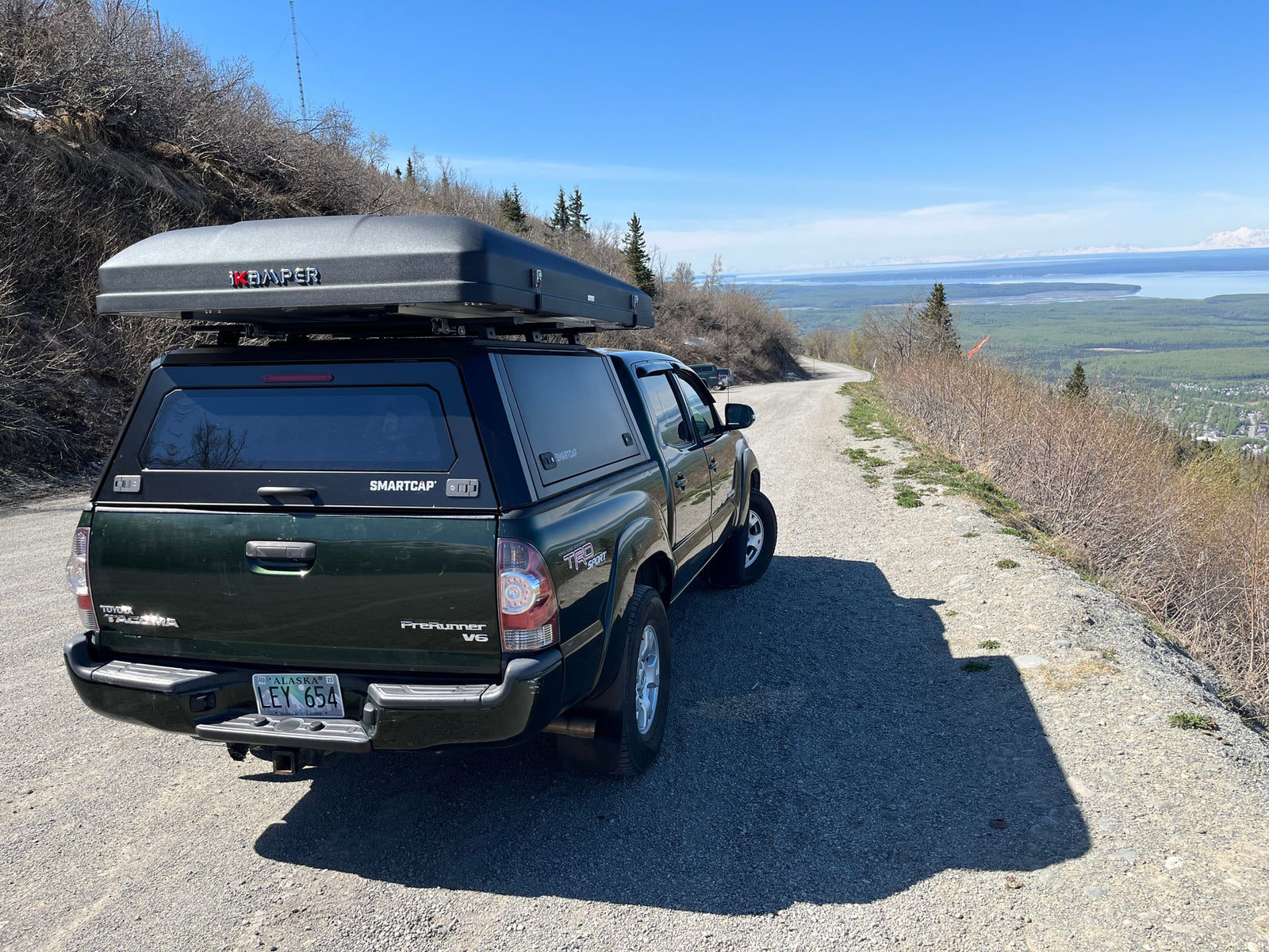An overlanding setup: Toyota Tacoma with Smartcap and iKamper rooftop tent. A great rv rental alternative for adventure travel.