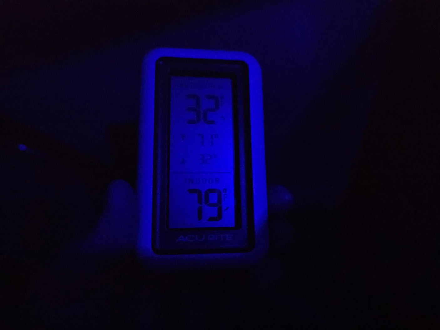This RV rental's thermometer glows blue, showing 32°F outside and a warm 79°F inside. Cozy comfort on the road.