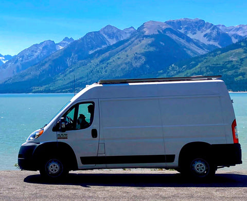 Farley | Cozy Dodge Ram Camper for 2 — Solar, Toilet, Roof Deck! overland rental