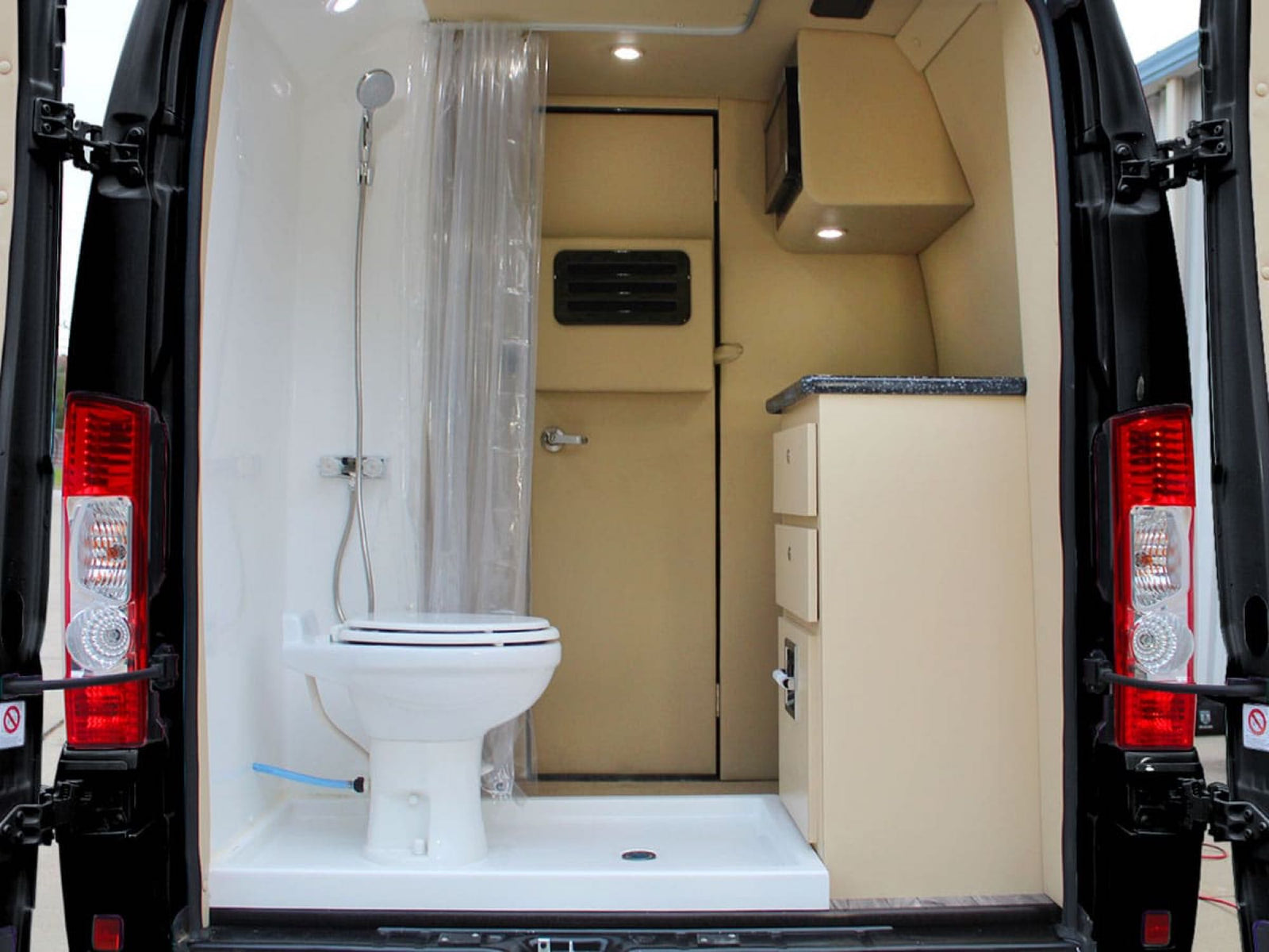 comfortable design.|Inside a premium rv rental: plush cream seating