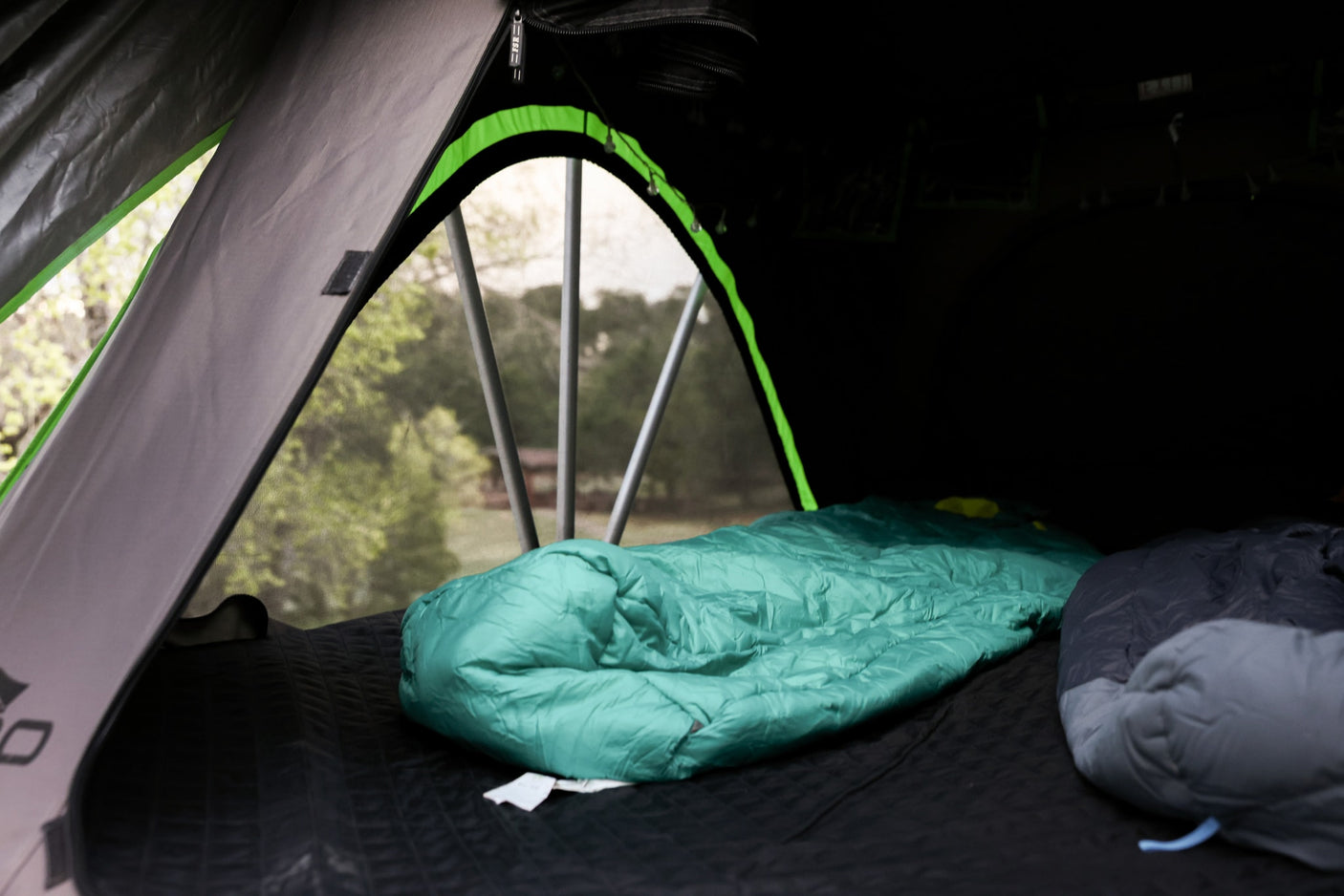 and storage.|RV rental interior: cozy living space with two tan convertible sofas