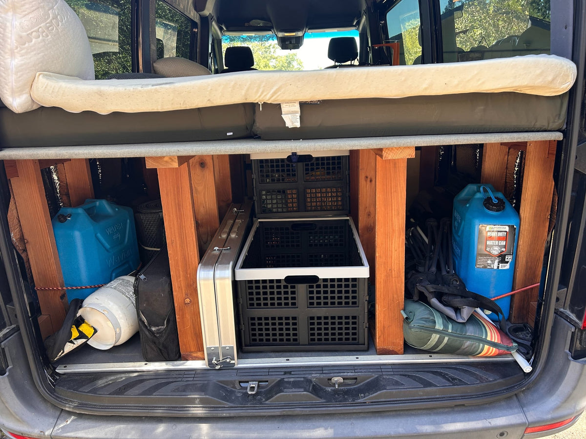 and refreshing nature views through the windows.|RV rental interior: Looking forward from the living area to the front seats — photo 10