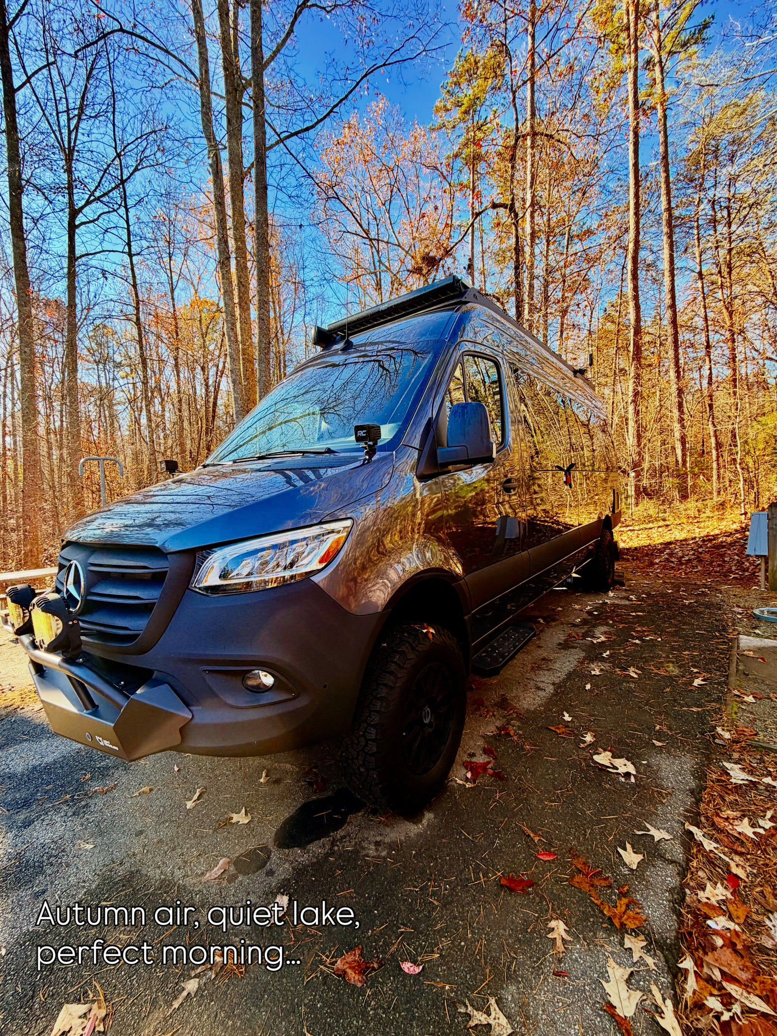 This custom Mercedes Sprinter campervan RV rental is perfect for autumn adventures among fall foliage.