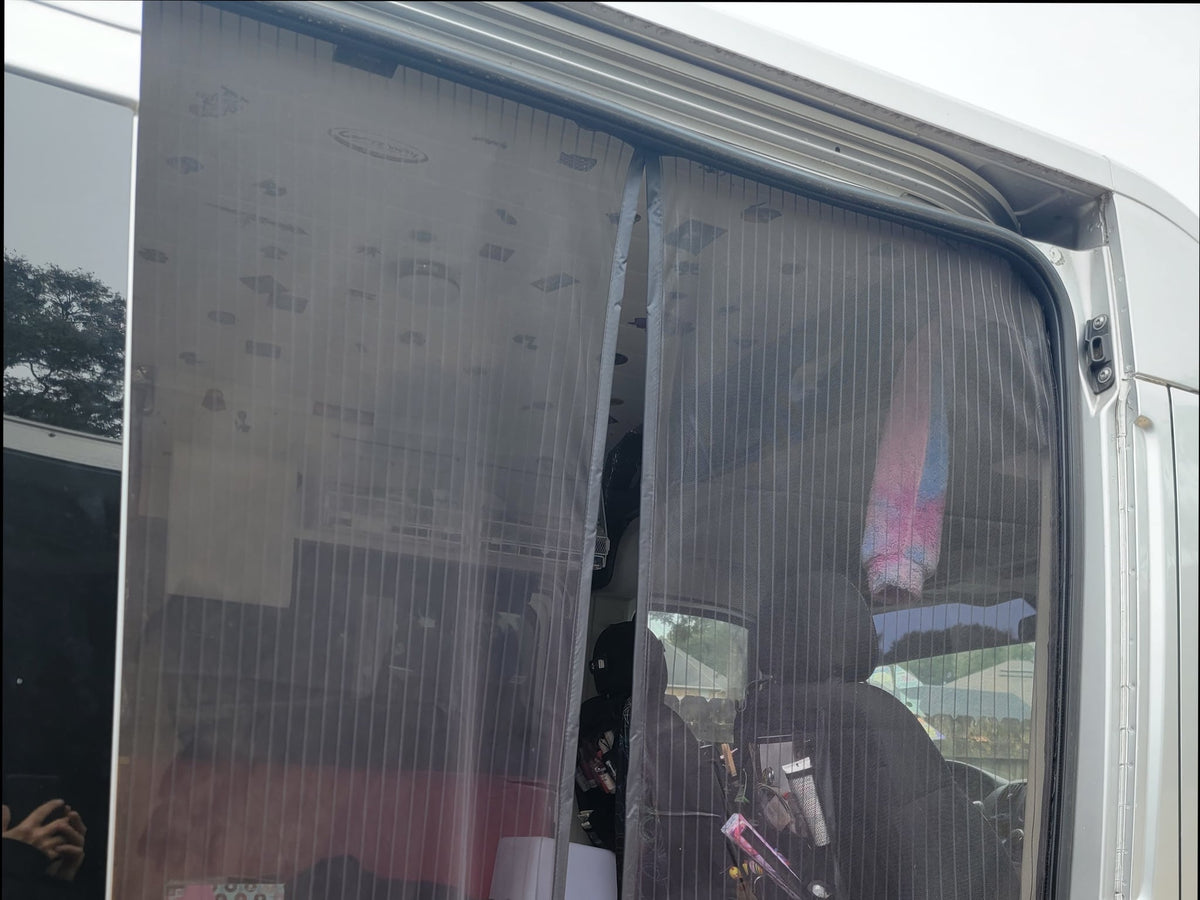 parked on a sunny driveway.|Silver RAM ProMaster conversion van — photo 3