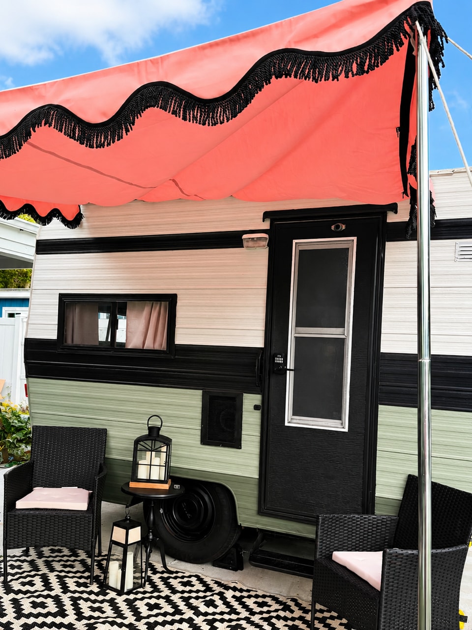 and overhead storage cabinets.|Compact RV rental kitchen features a Keurig coffee station