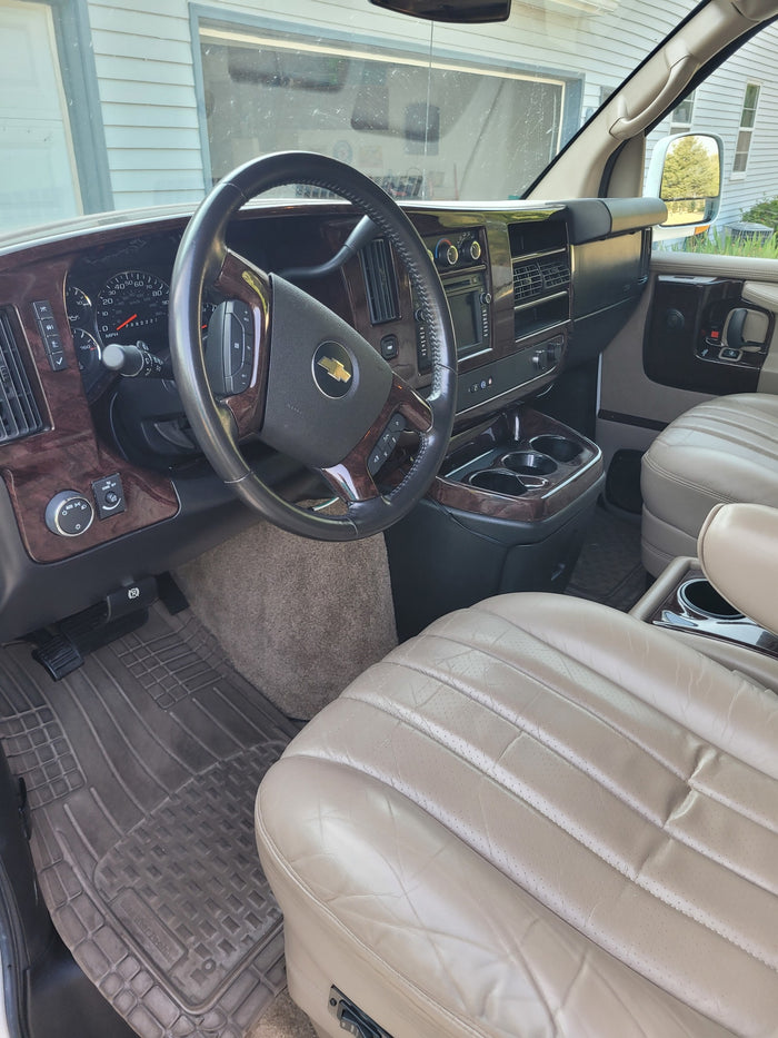 great for an rv rental.|RV rental overhead console: Light and climate controls visible