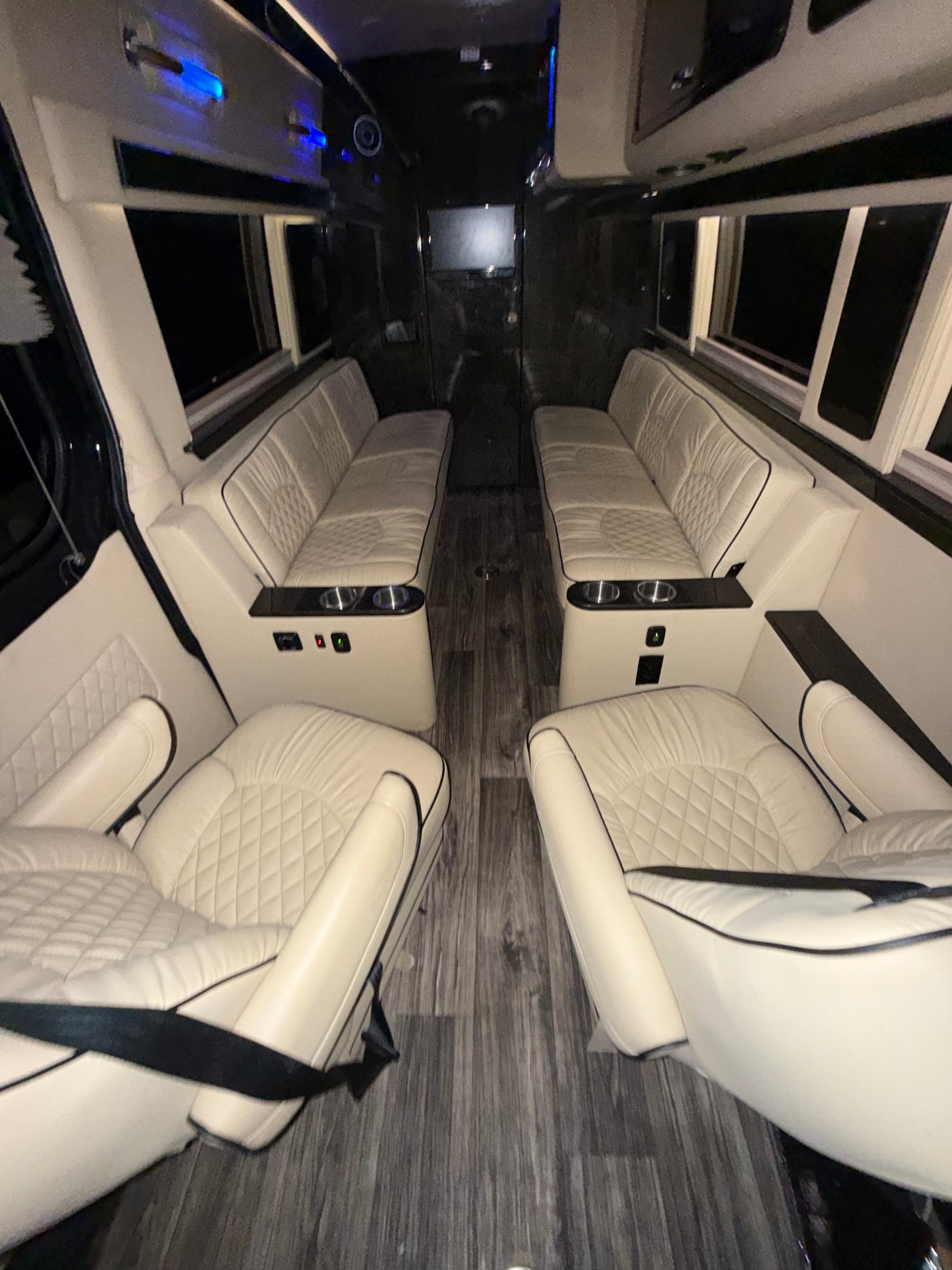Step inside this luxurious rv rental! Cream leather seating, wood floors & entertainment make for comfortable travel.