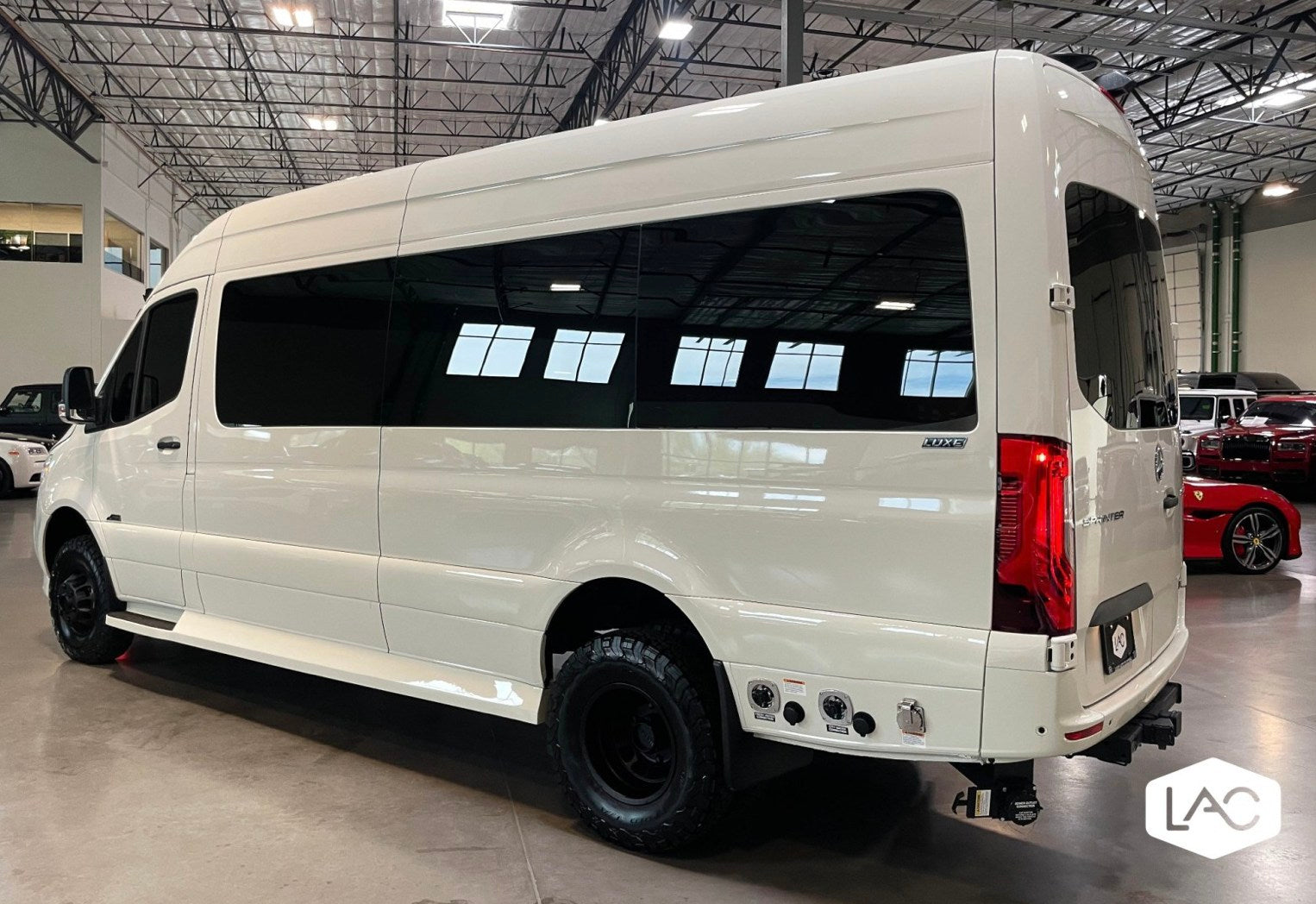 and a screen displaying a Netflix error. Perfect for travel comfort.|Luxury RV rental interior: comfortable quilted seating