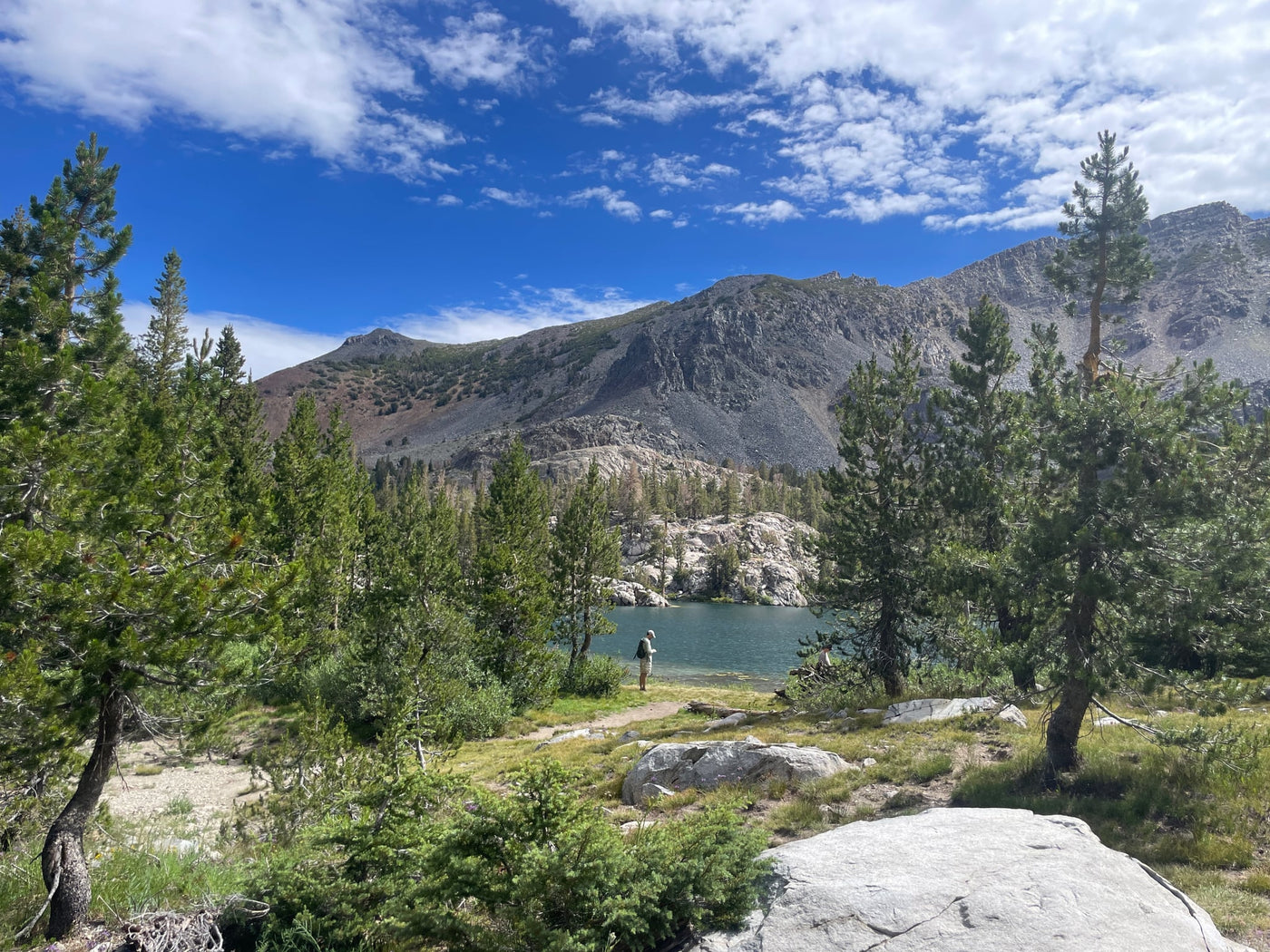 parked on a sunny street under a blue sky.|Bright sun illuminates a vast snowy mountain slope crisscrossed with ski tracks and evergreen trees. Plan your winter getaway with an RV rental!|Chairlift ride up a snowy mountain — photo 10