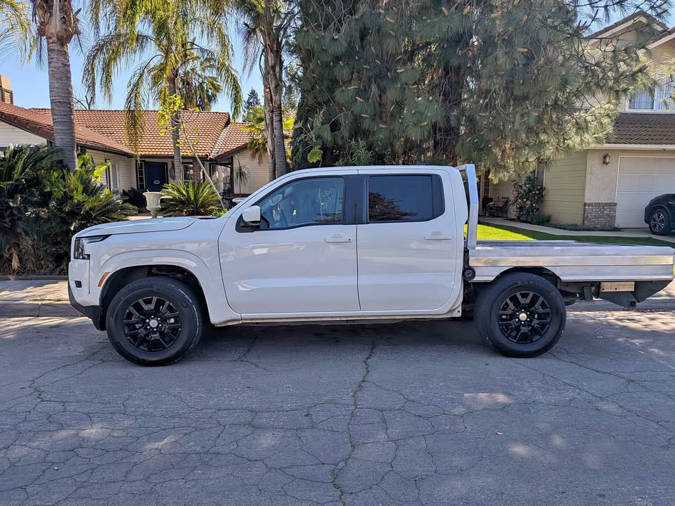2023 Nissan Frontier Crew Cab · LE Pickup 4D 5 ft in Fresno, CA (photo 1) — photo 1