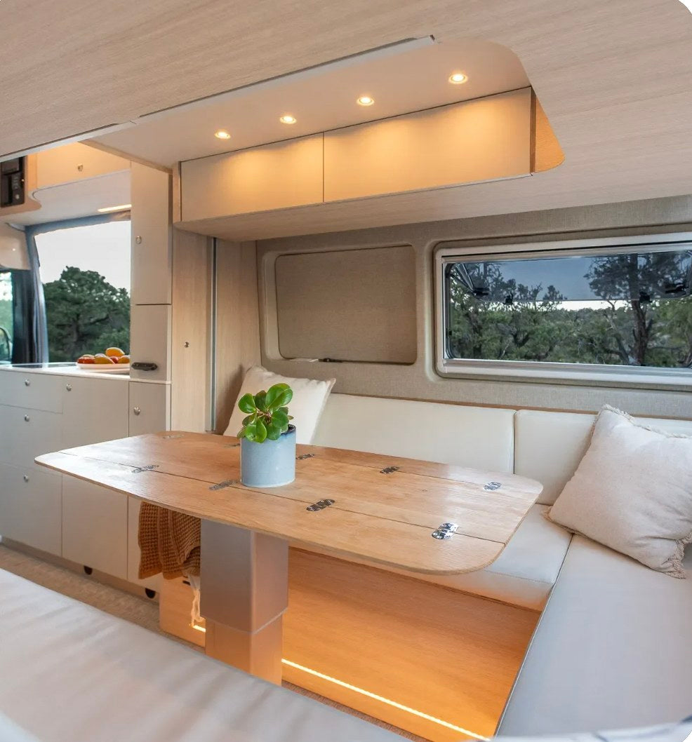 spare tire & storage for your next adventure.|This modern RV rental kitchen has a sleek counter