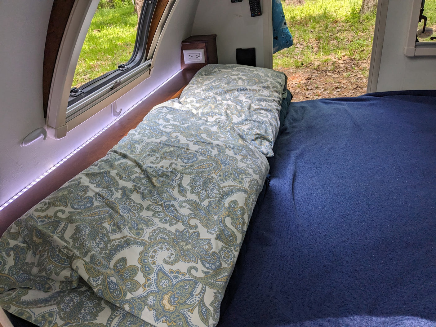 and fridge in this compact teardrop camper