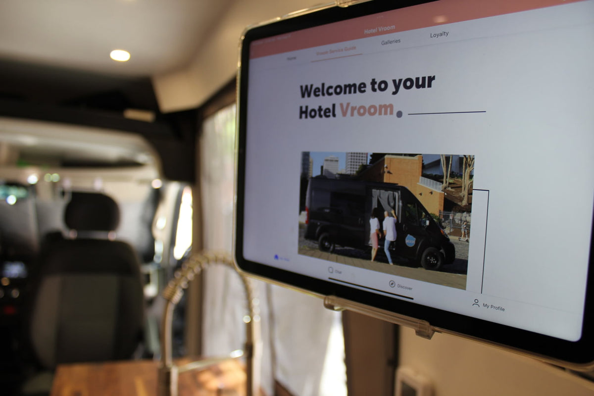 highlighting the cozy travel space.|Discover adventure: Black camper van for rv rental — photo 6