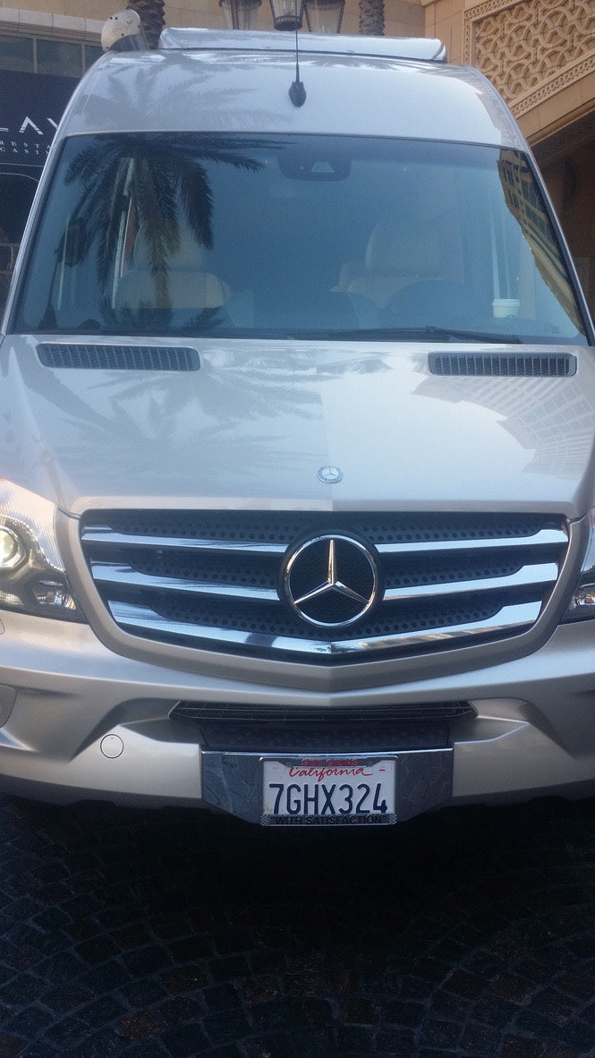 ideal for travel and road trips.|This silver RV rental van