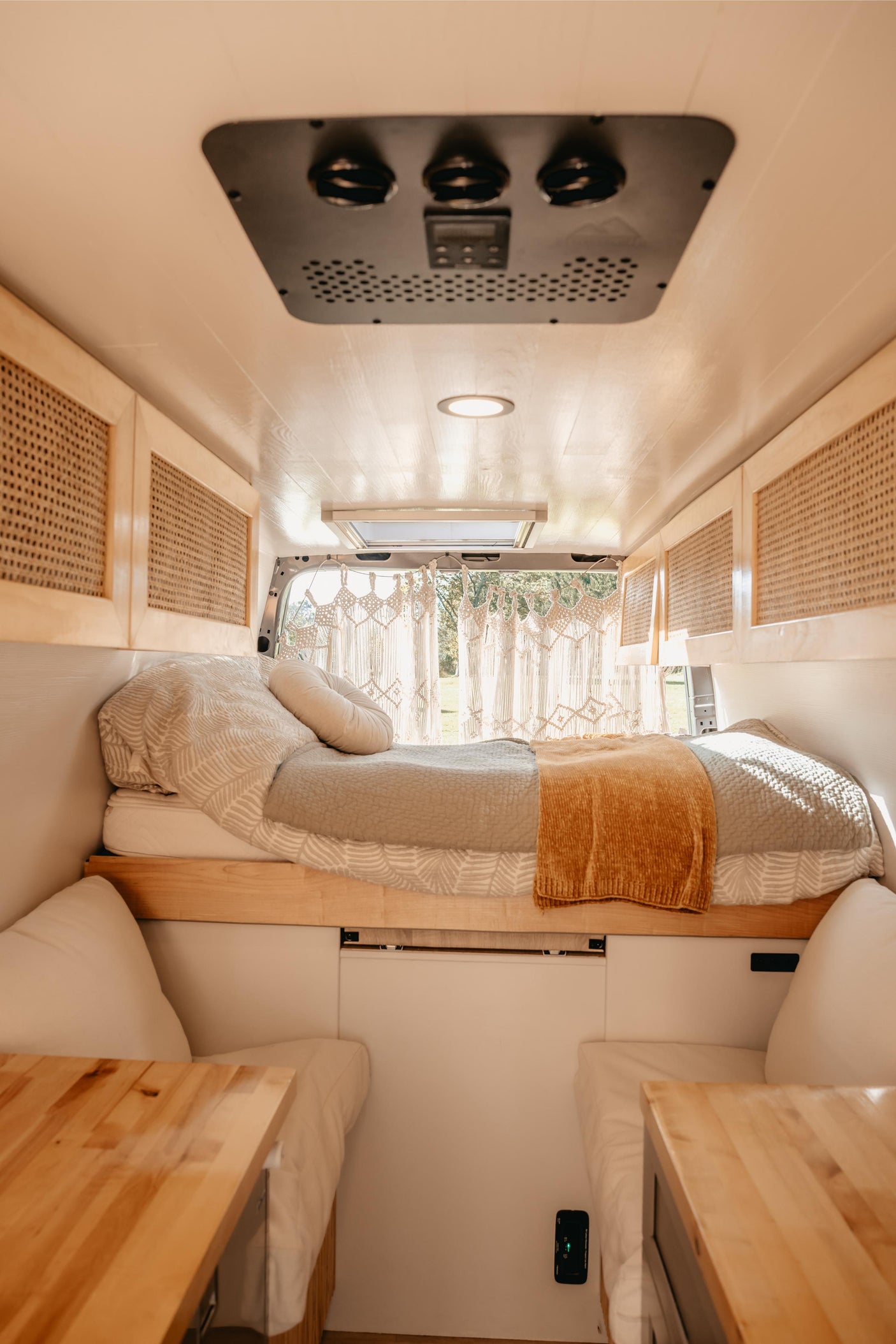 and a kettle.|Rugged Mercedes-Benz Sprinter van with off-road features