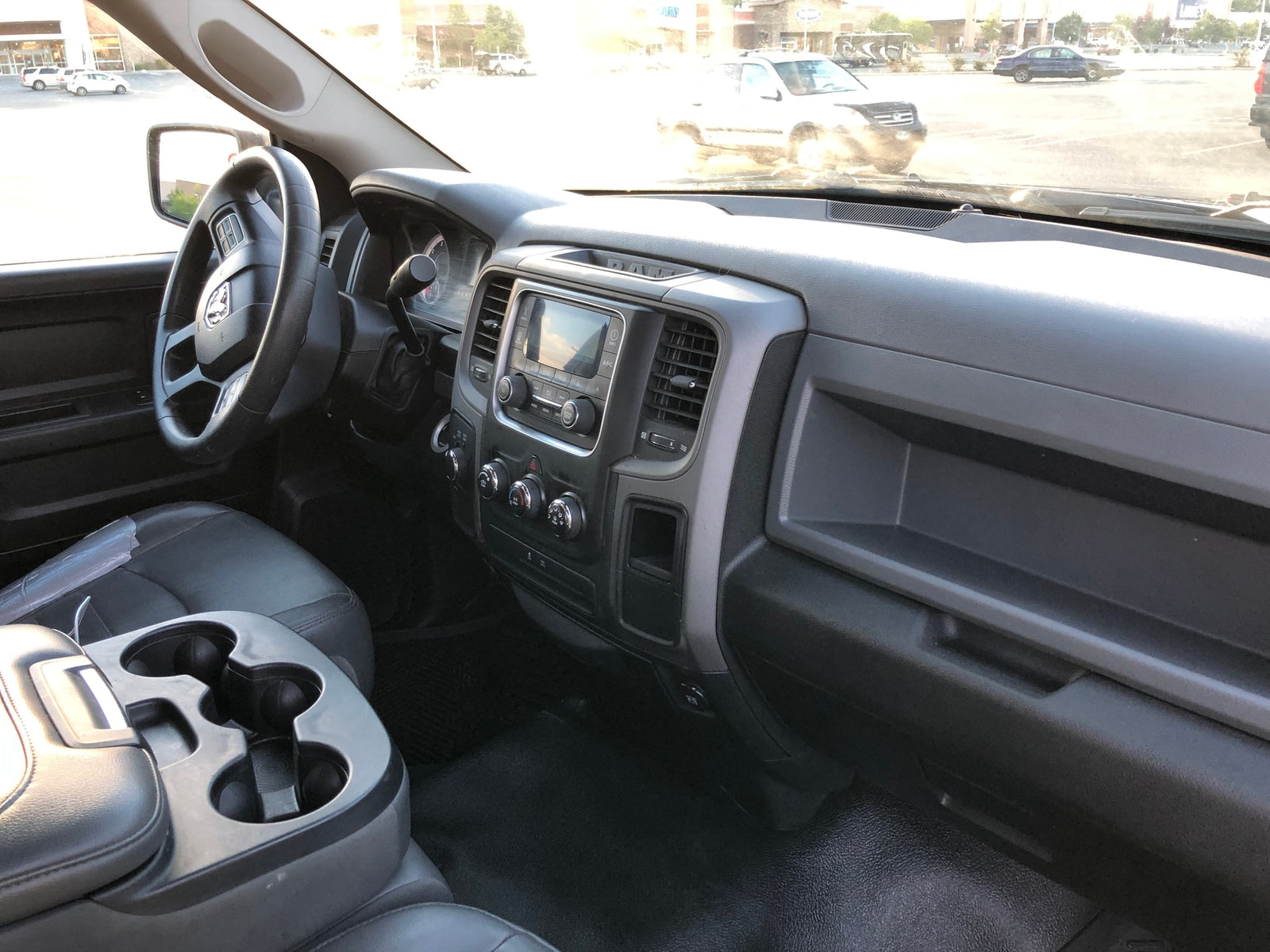 Driver's view from an RV rental truck: black dashboard