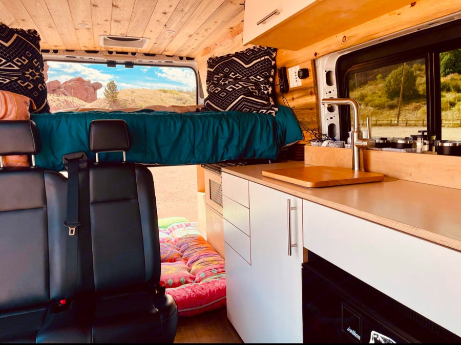 wood-paneled camper van