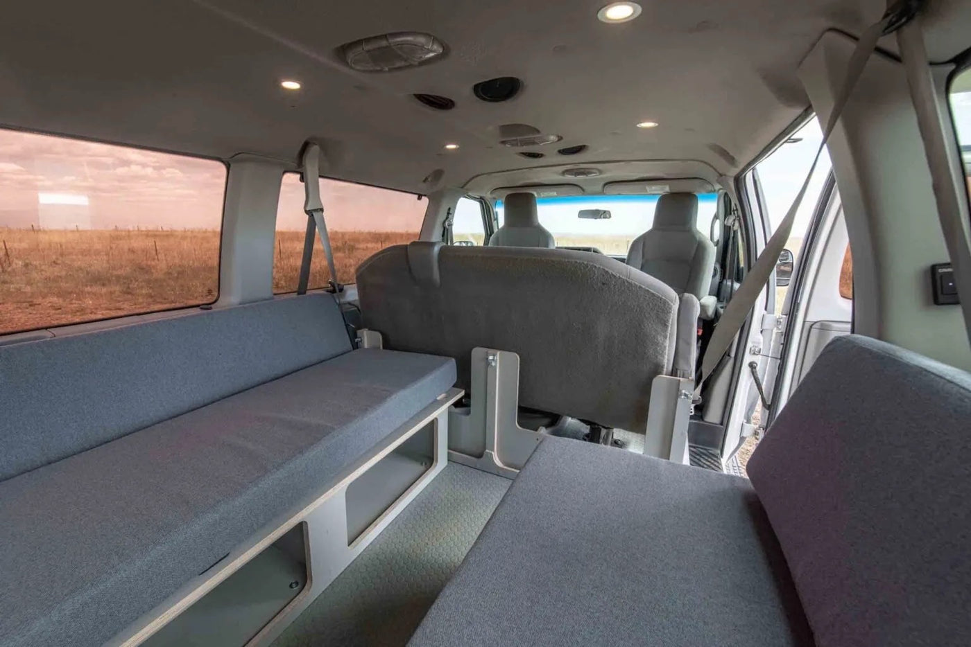 segmented bed fills this camper van's interior — photo 15