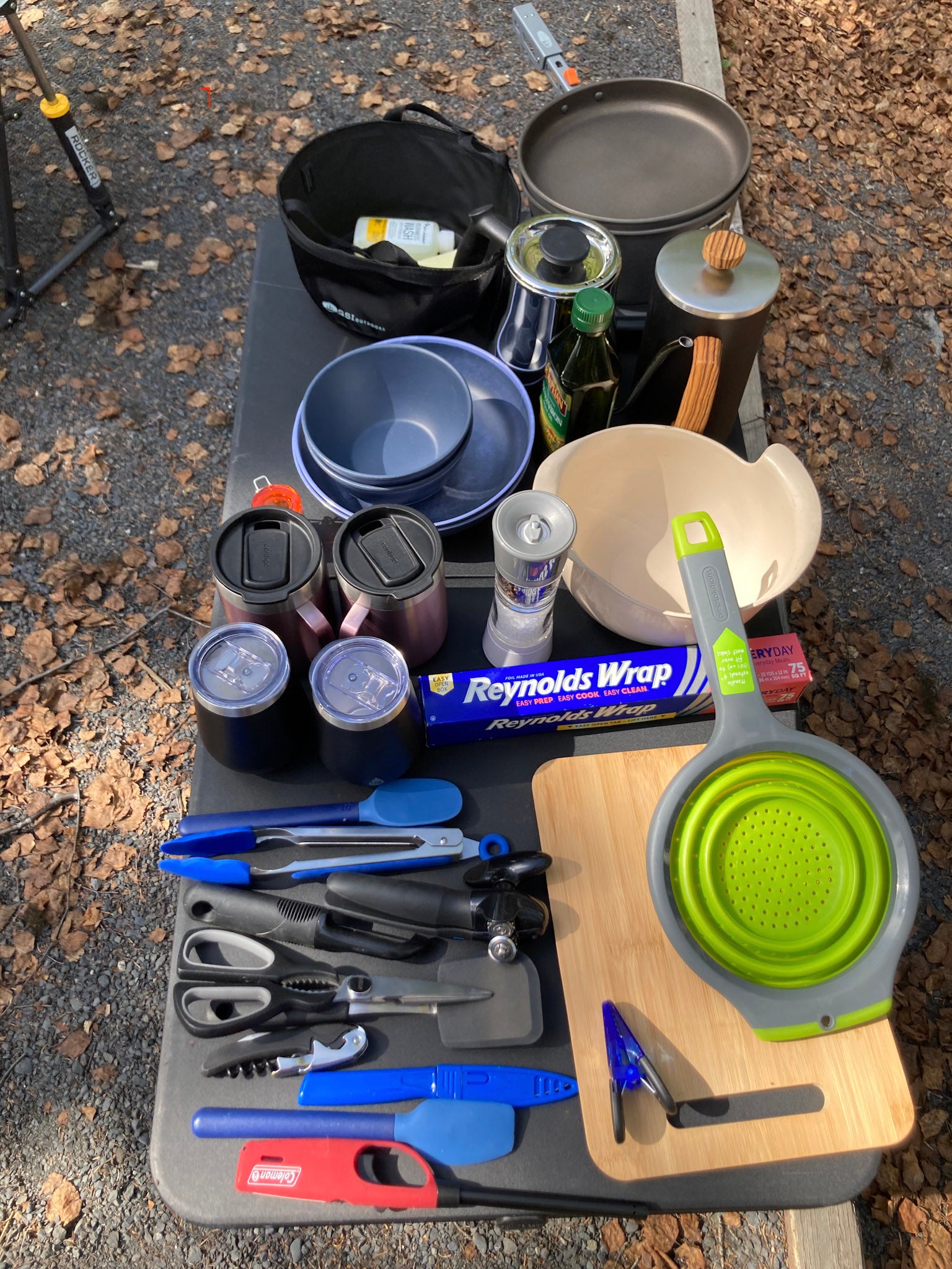 RV rental kitchen essentials: Complete camping gear, pots, pans, utensils & coffee maker for outdoor cooking.
