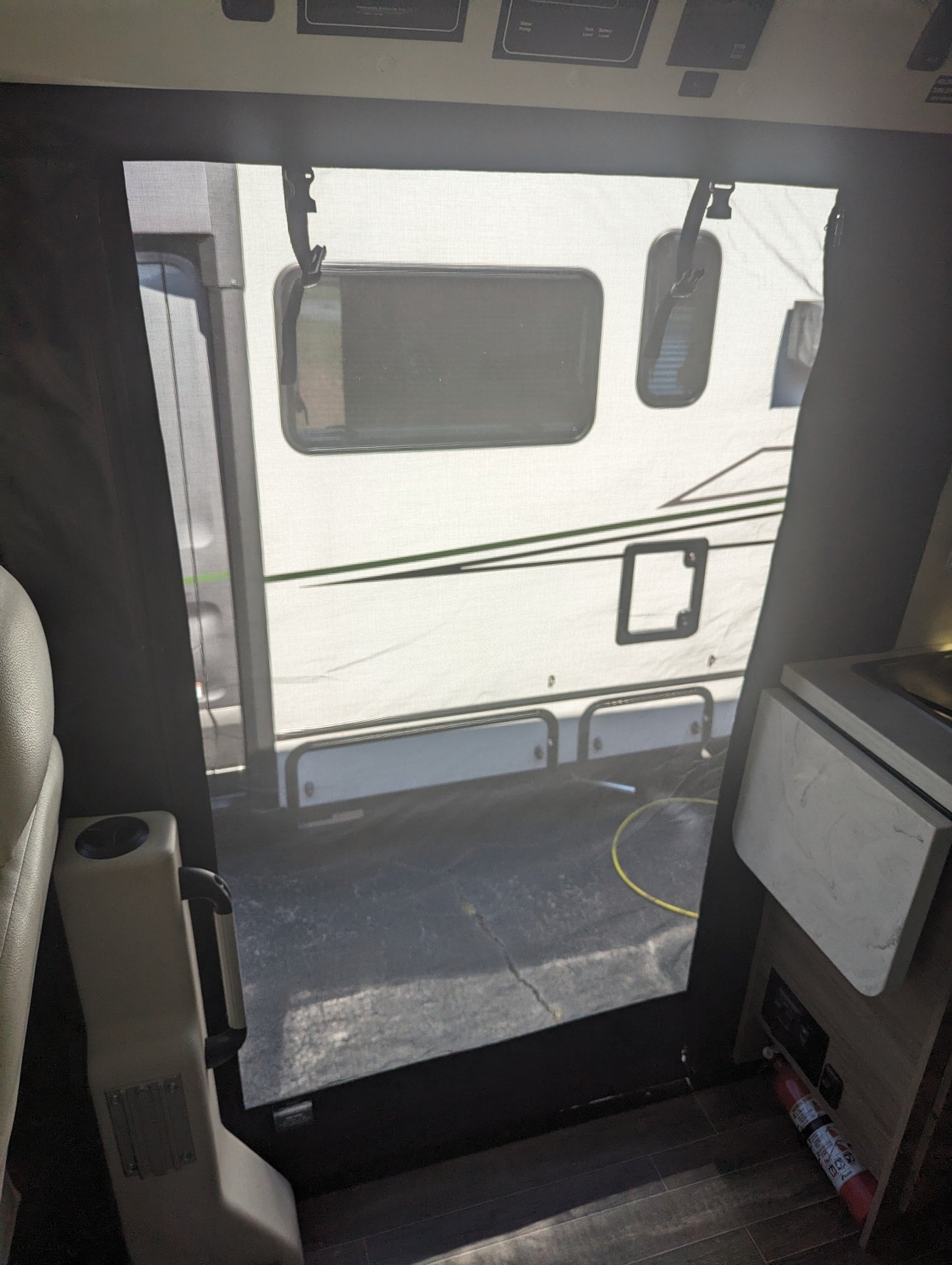 and Zamp solar input for convenience.|Underside view of an rv rental: propane system with Gas-Flo cap