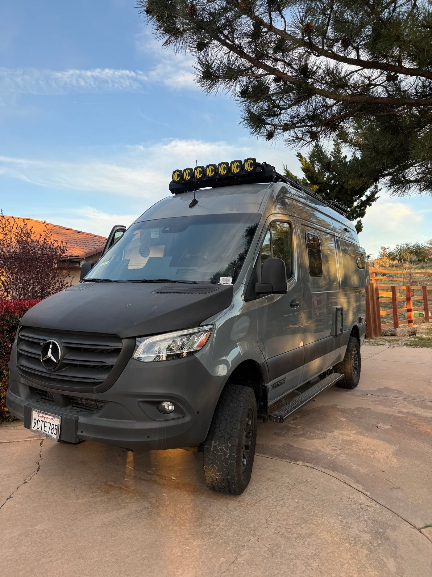 customized for off-road trips with a roof light bar & chunky tires — photo 1