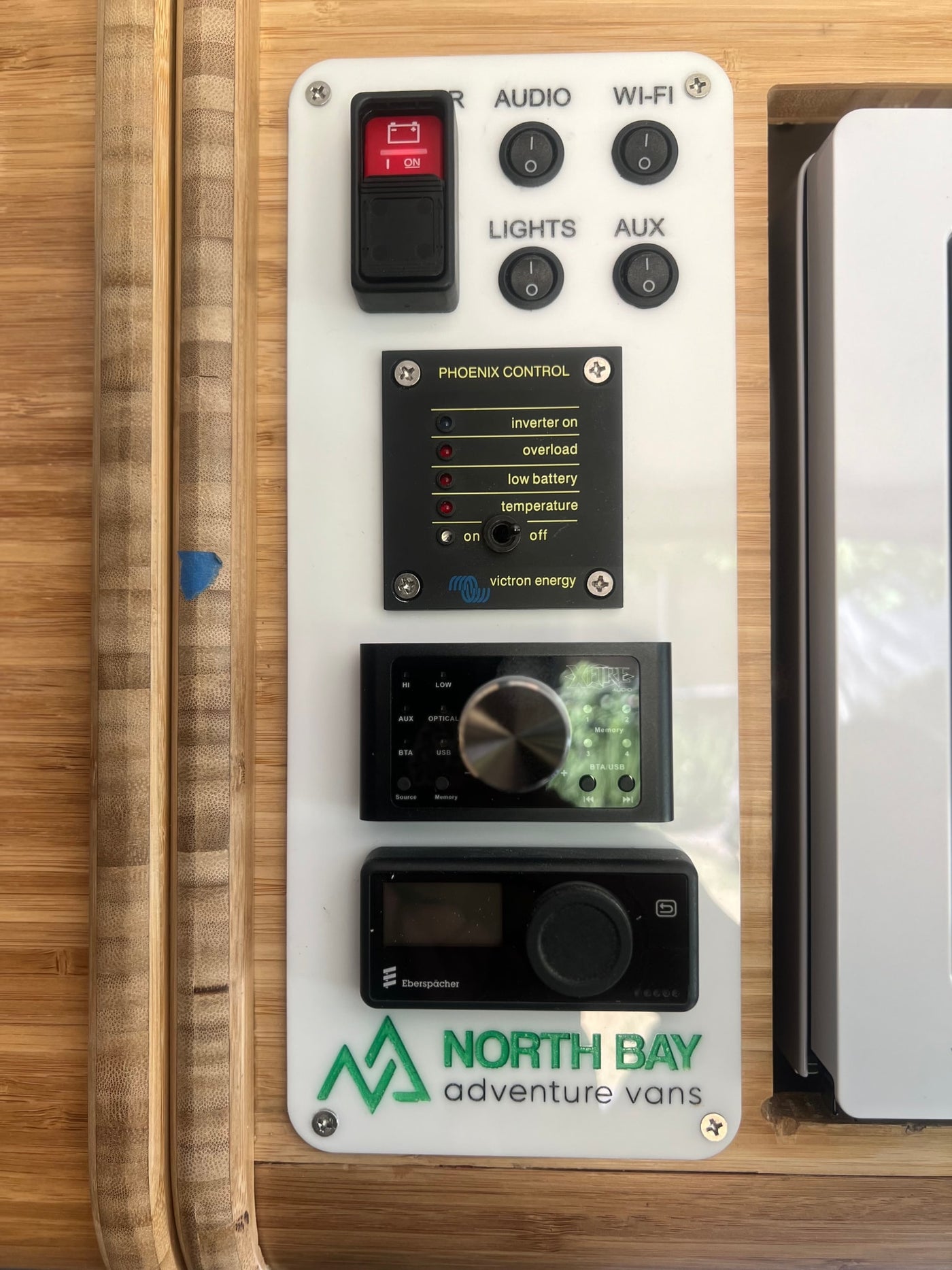 RV rental van's control panel: Victron power, Xfire audio, Eberspächer heater for comprehensive vehicle management. — photo 11
