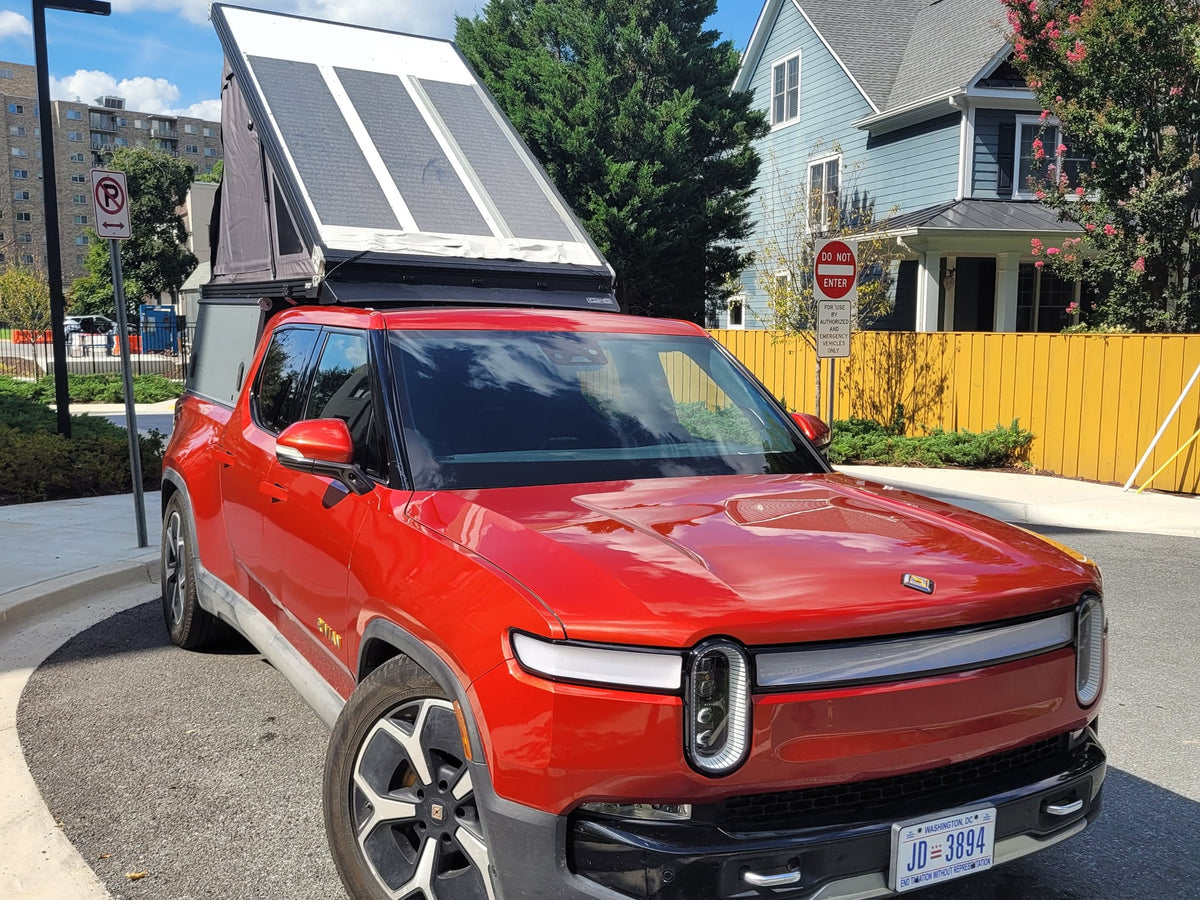 parked on a street. Explore 'rv rental' options for adventure.|Rivian truck bed with GFC camper — photo 16