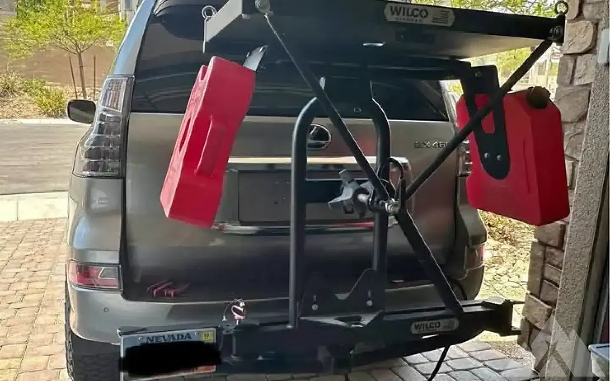 Rear tire hitch carrier with swing out — used tire carriers & swing outs for sale — photo 1