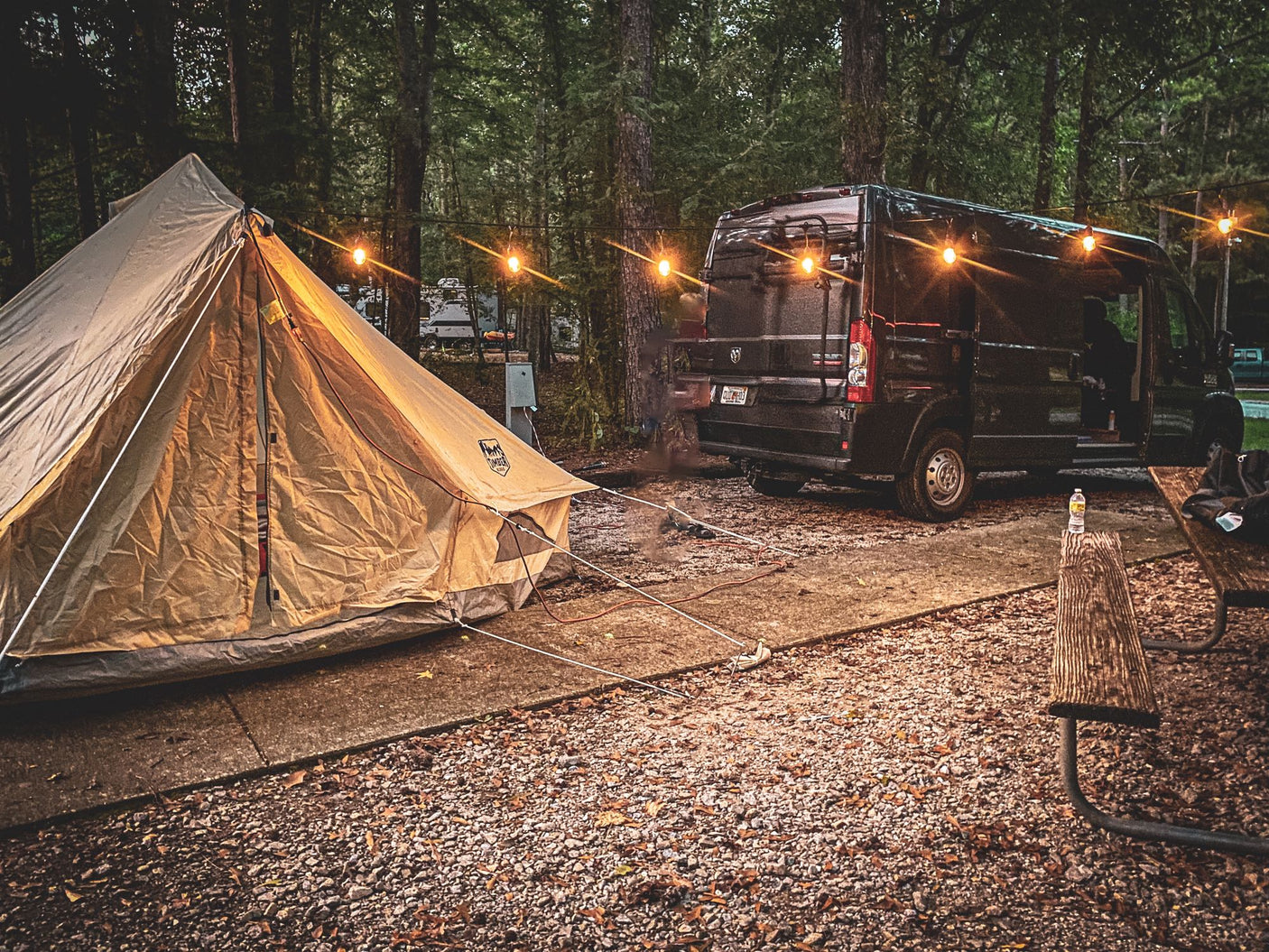 and versatile passenger seating.|Explore this custom RV rental interior: wood-paneled walls