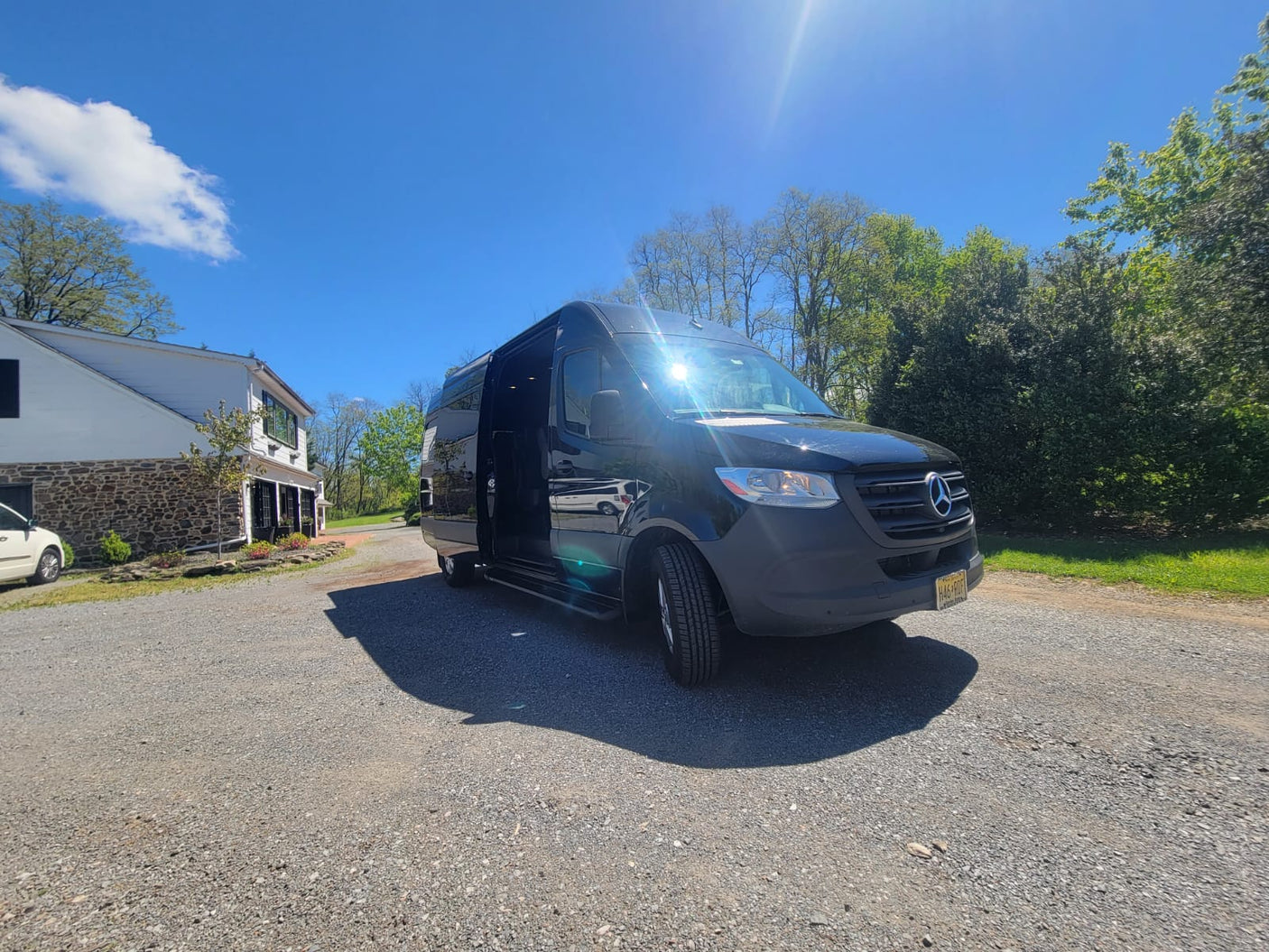 revealing plush beige seating and custom ceiling lighting.|Experience luxury: Plush interior of an RV rental