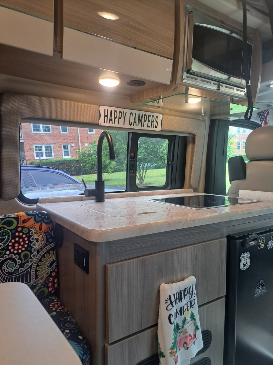 is ready for your next rv rental road trip.|Tour this inviting RV rental interior: a functional kitchen