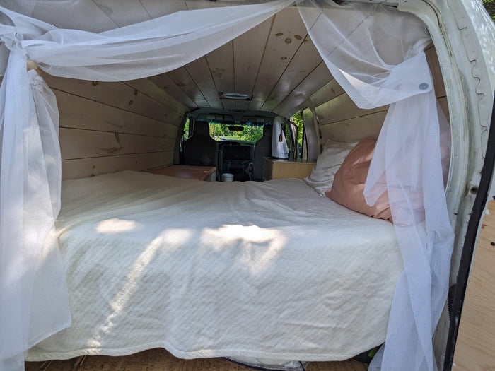 Cozy n cute 2014 Ford Econoline - sink, solar power, wood paneling