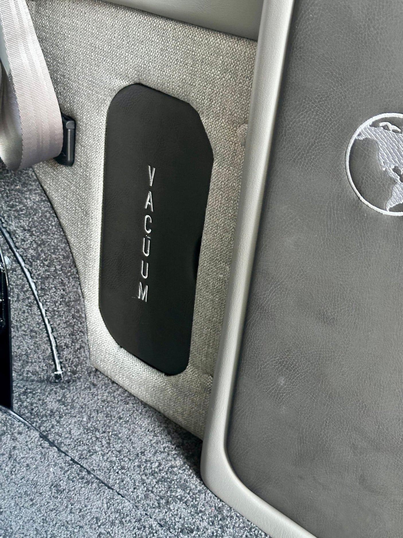 and a mounted screen.|Inside an **rv rental**: comfort console with cup holders