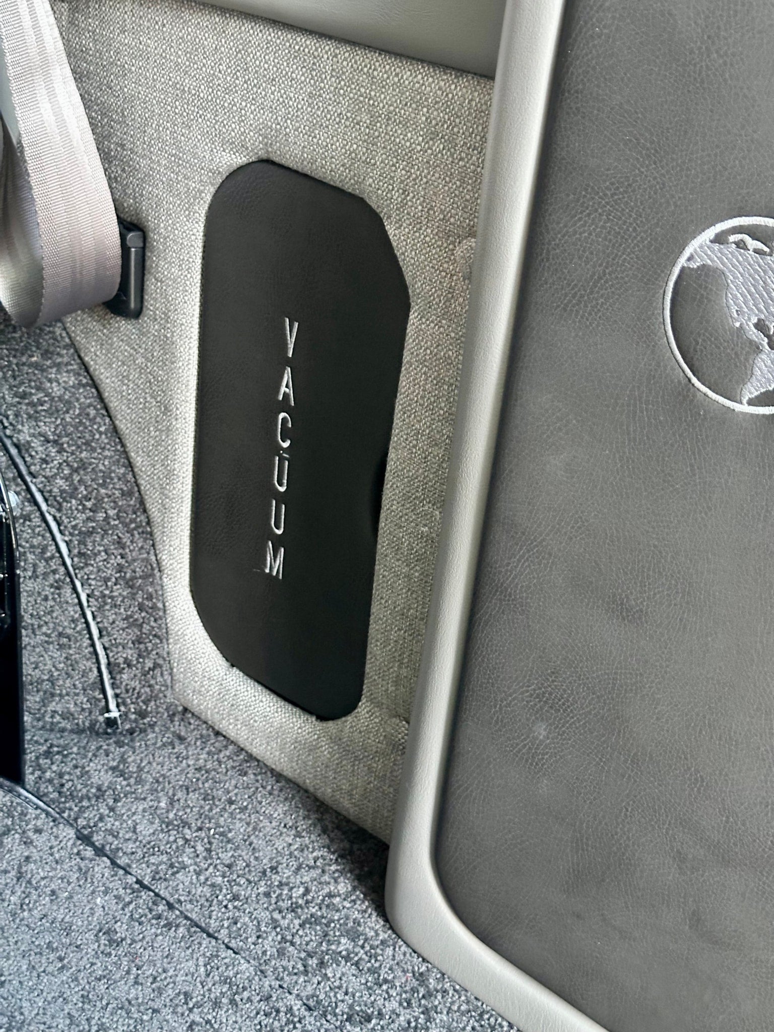 and a mounted screen.|Inside an **rv rental**: comfort console with cup holders