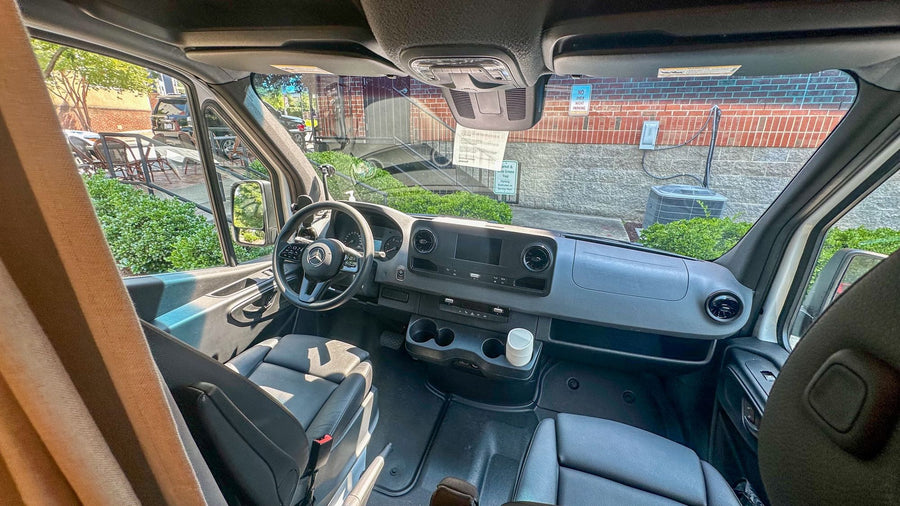 Experience the comfort of an rv rental! Spacious Mercedes van interior with modern dashboard