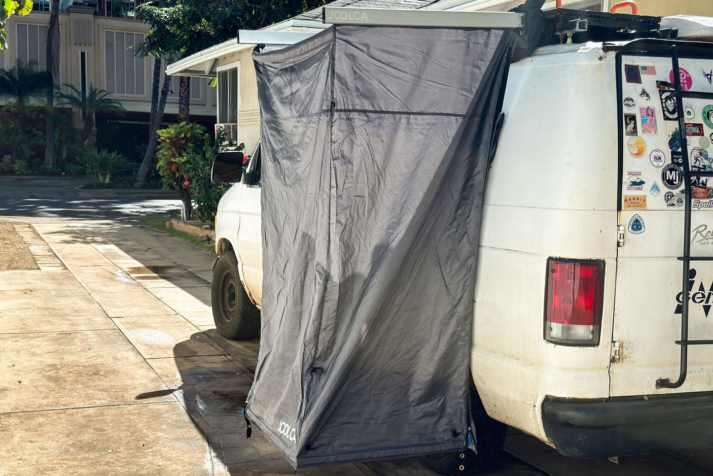 RV rental with Joolca privacy tent deployed, perfect for outdoor showering or changing during camping.