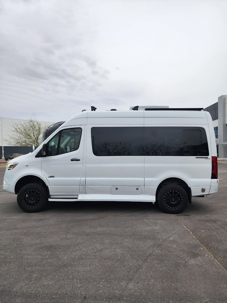 This white Sprinter camper van