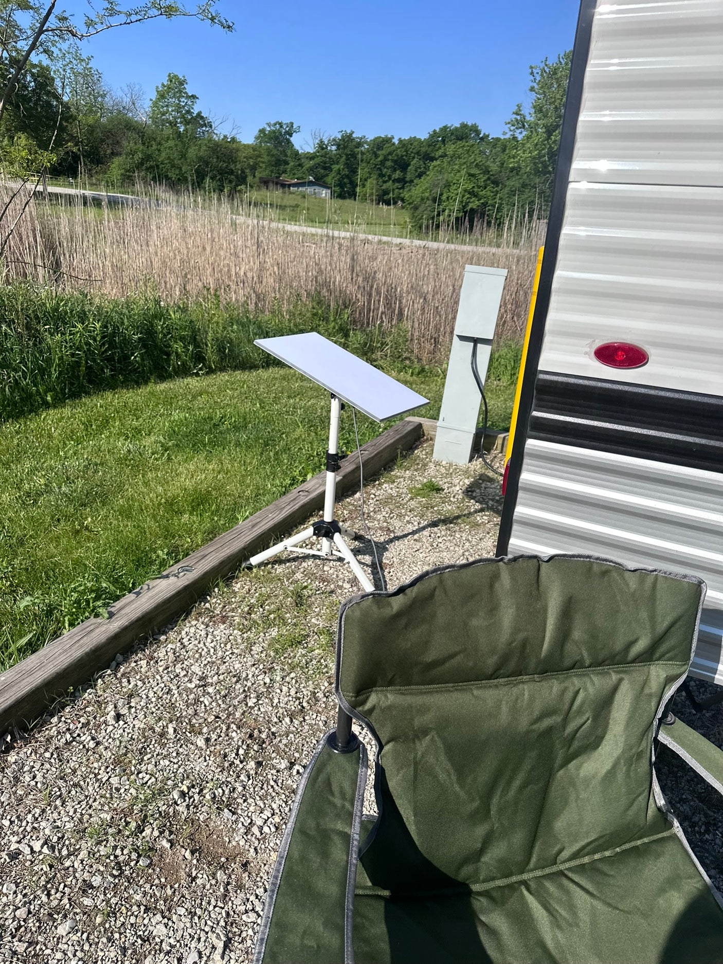 and safety features like a fire extinguisher. Home on wheels.|RV rental kitchen featuring a sink