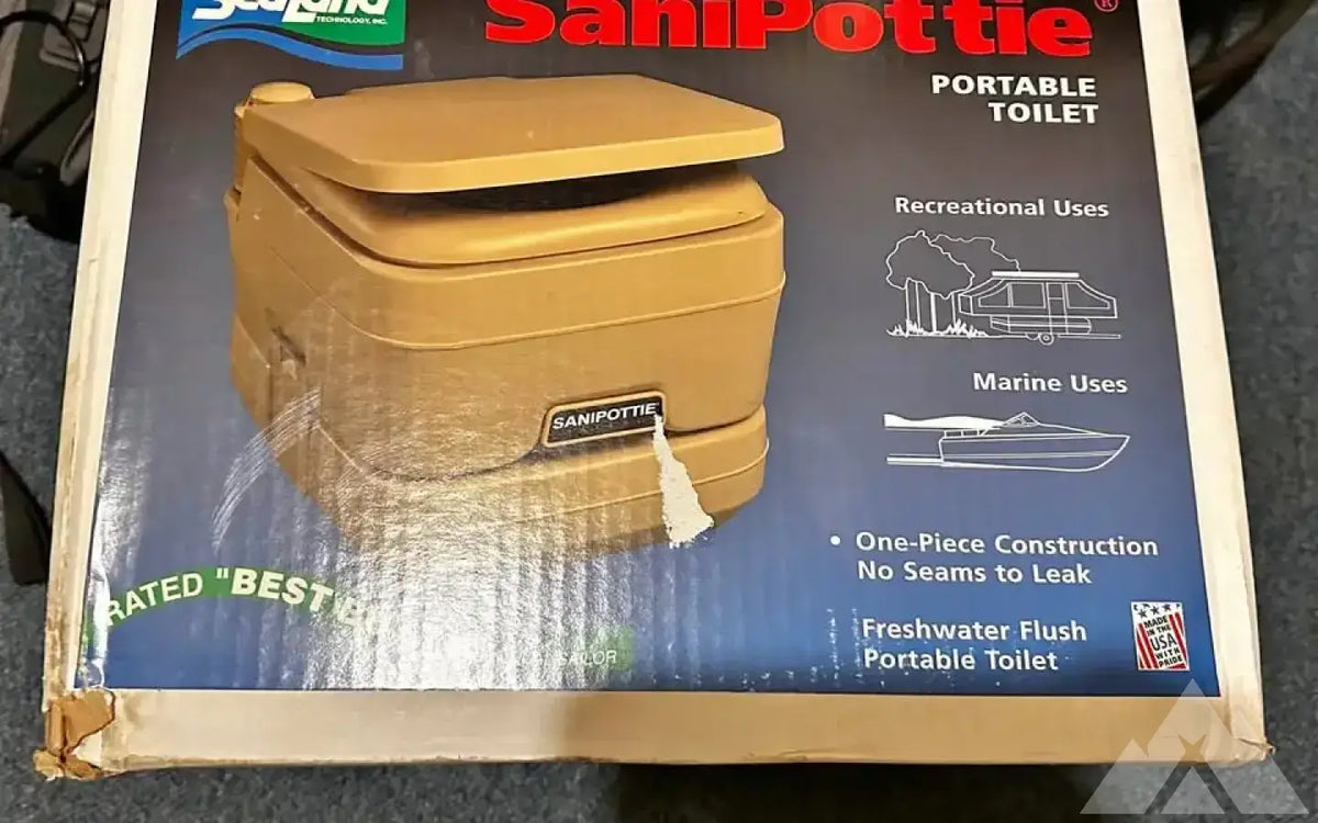 SaniPottie Portable toilet — new showers & toilets for sale — photo 1