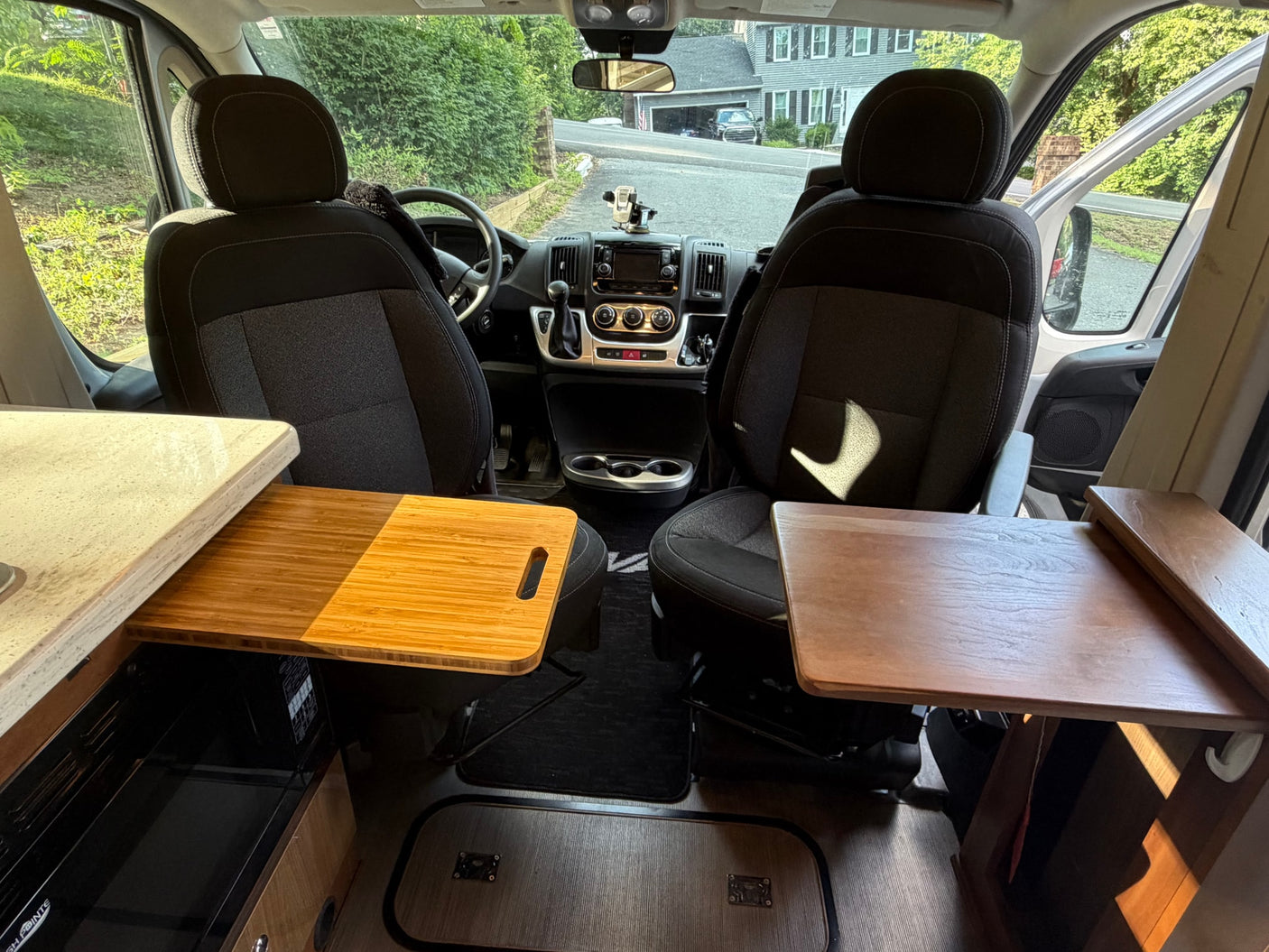 ready for adventure.|RV rental wet bath interior: compact toilet & shower. View into the camper van's cabin