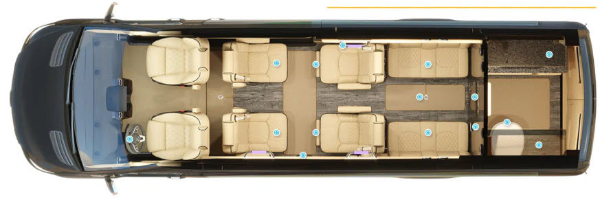 Detailed overhead view of a luxury RV rental interior layout, showing spacious seating, dining area, and rear bed for premium travel comfort.