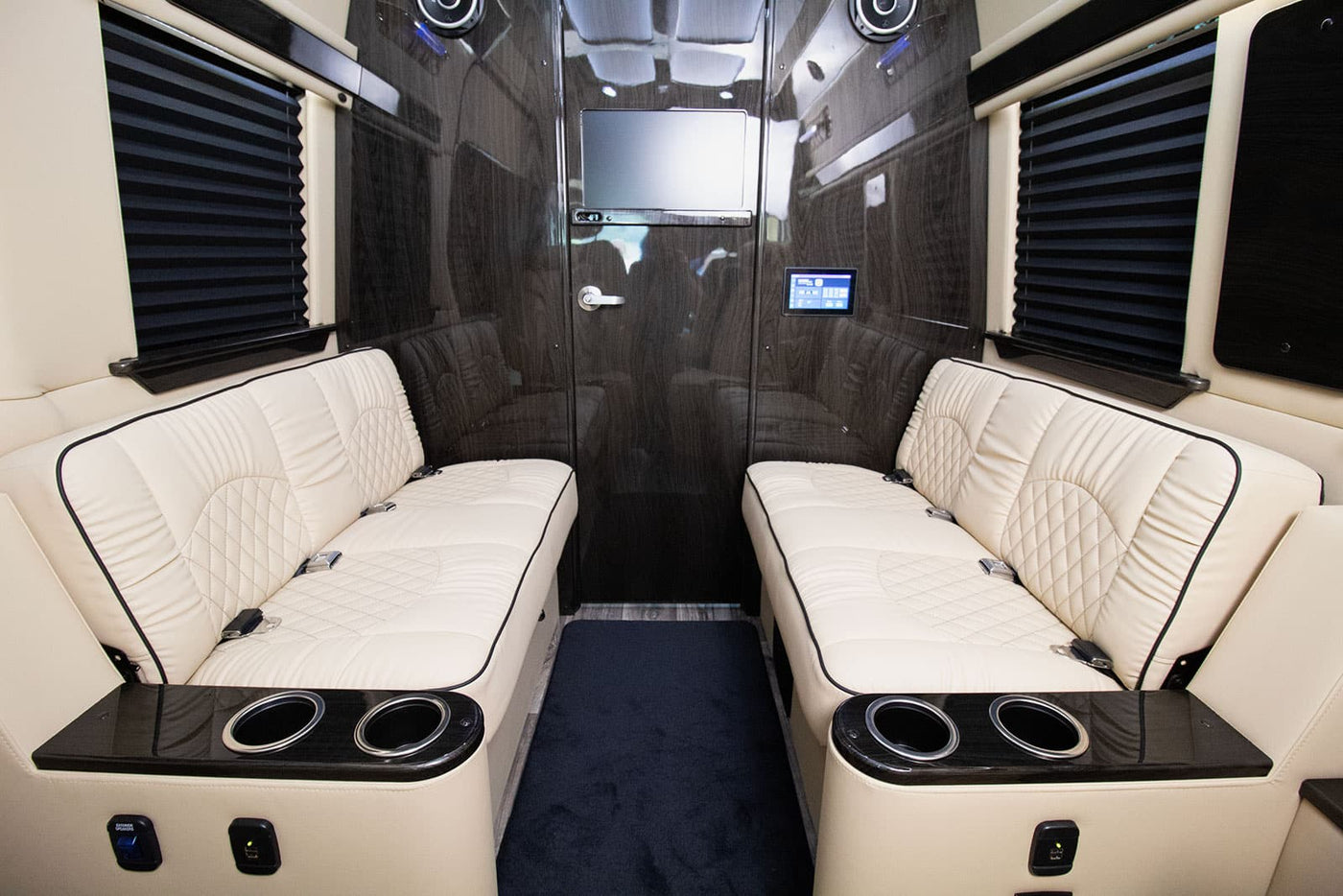 and ambient lighting. Ideal for travel comfort!|Inside a high-end RV rental: cream leather seats — photo 11