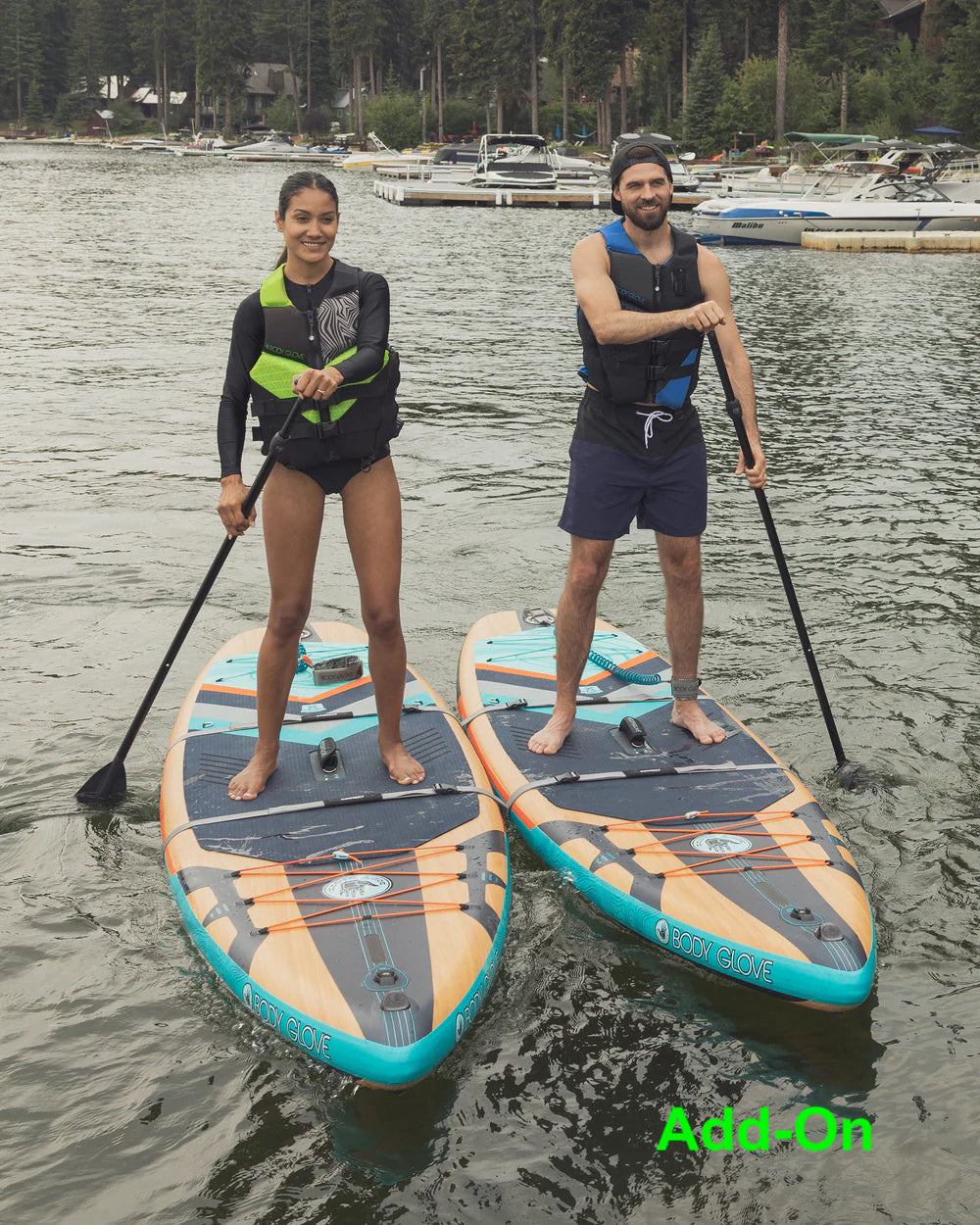 RV rental adventures often include lakeside fun like paddleboarding for two.