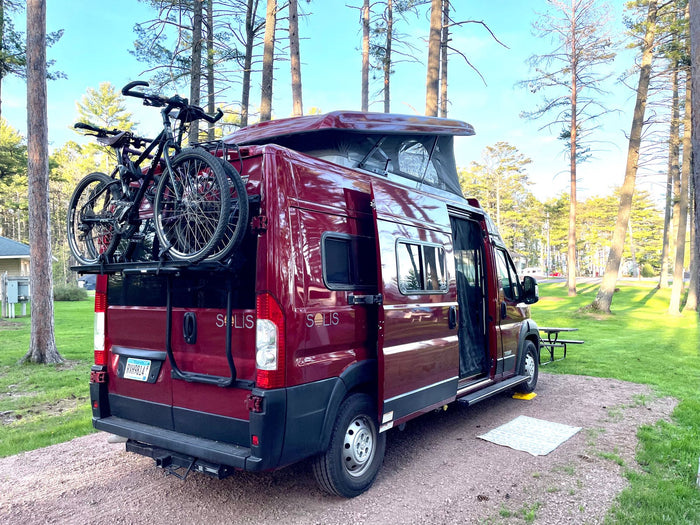 parked on a gravel pad in a sunny