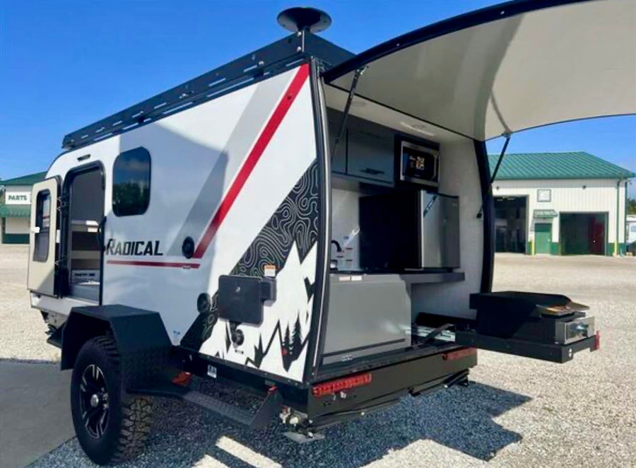 a compact unit with open door & propane